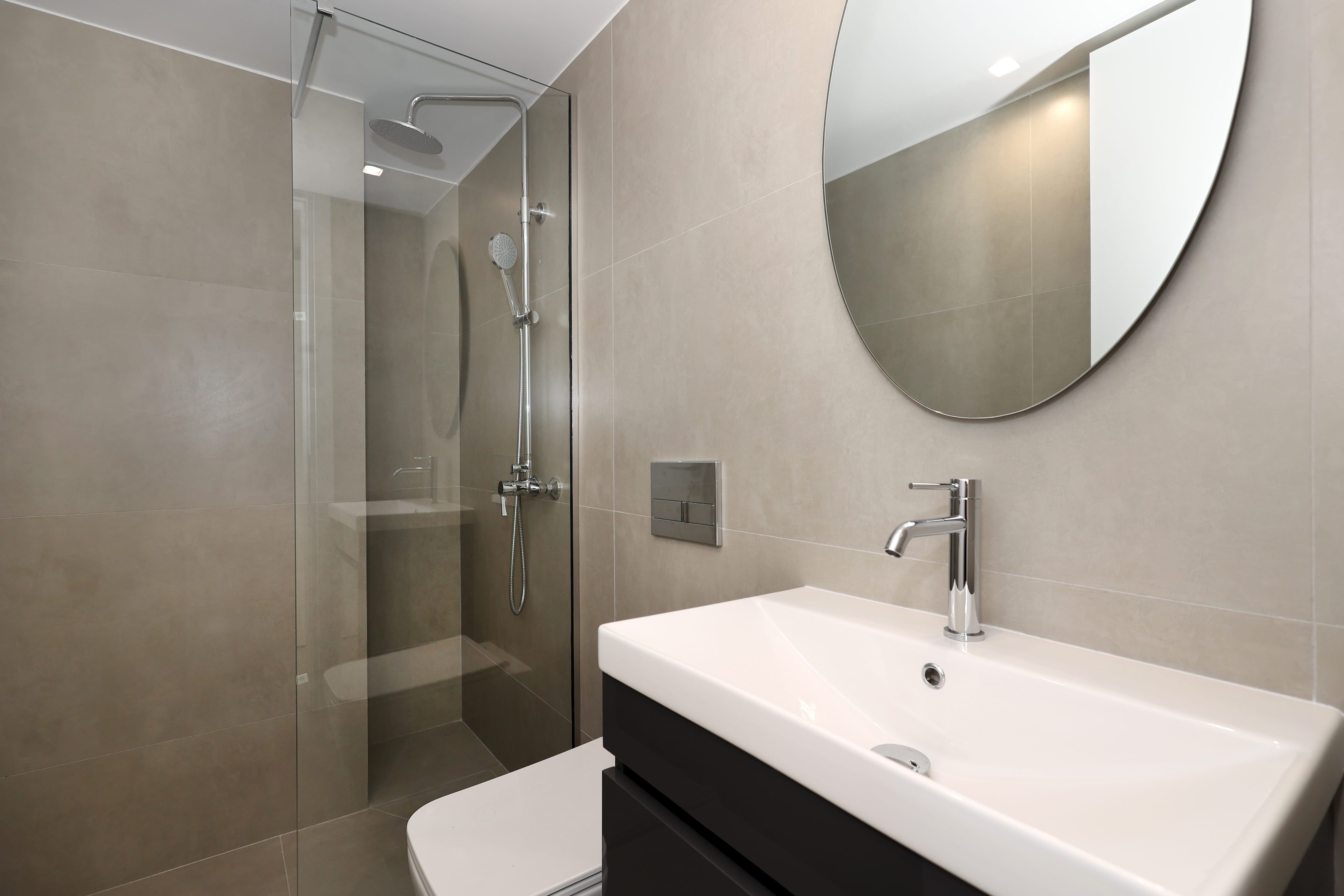 a bathroom with a glass shower