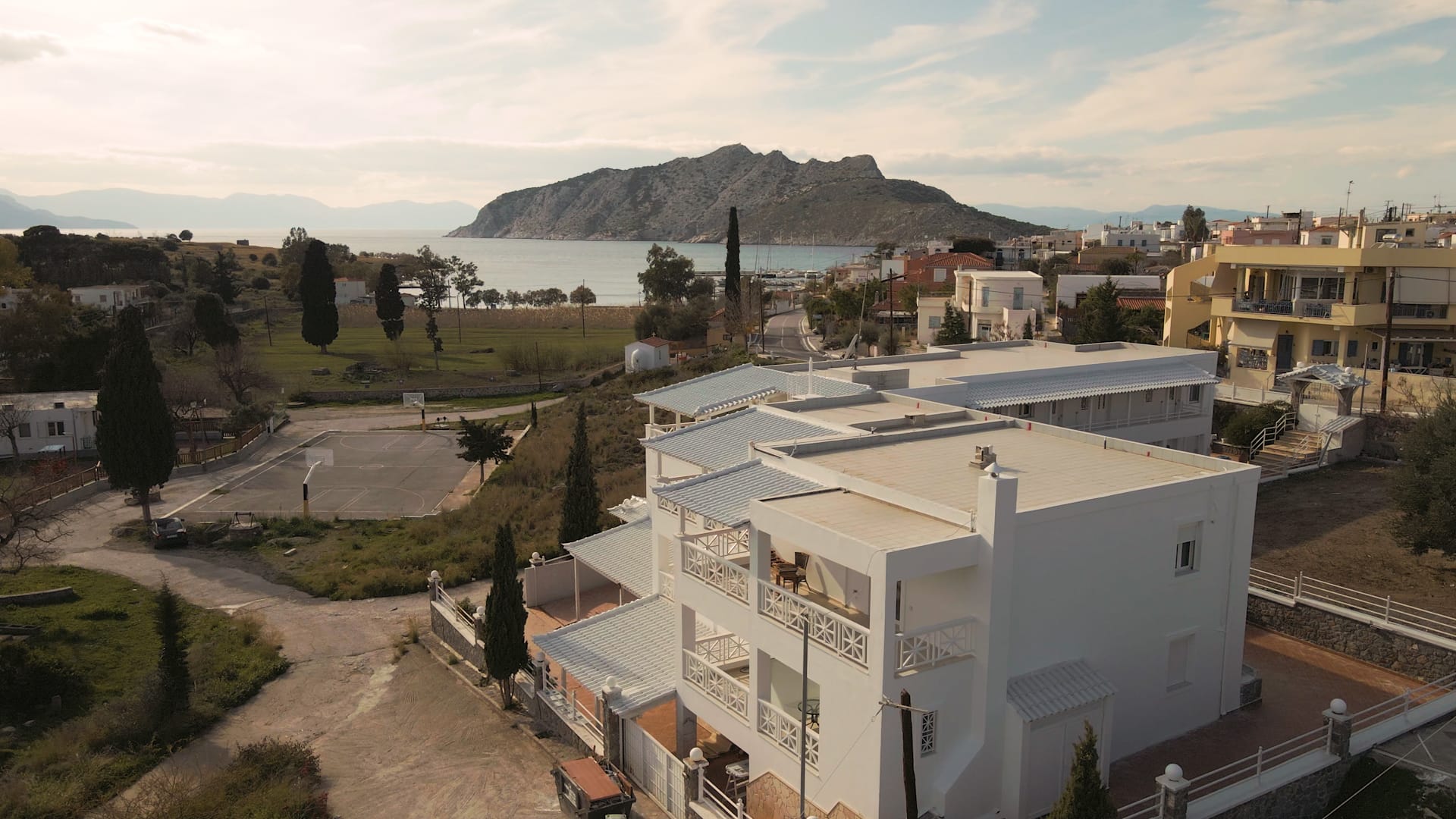 a high angle view of buildings and a body of water