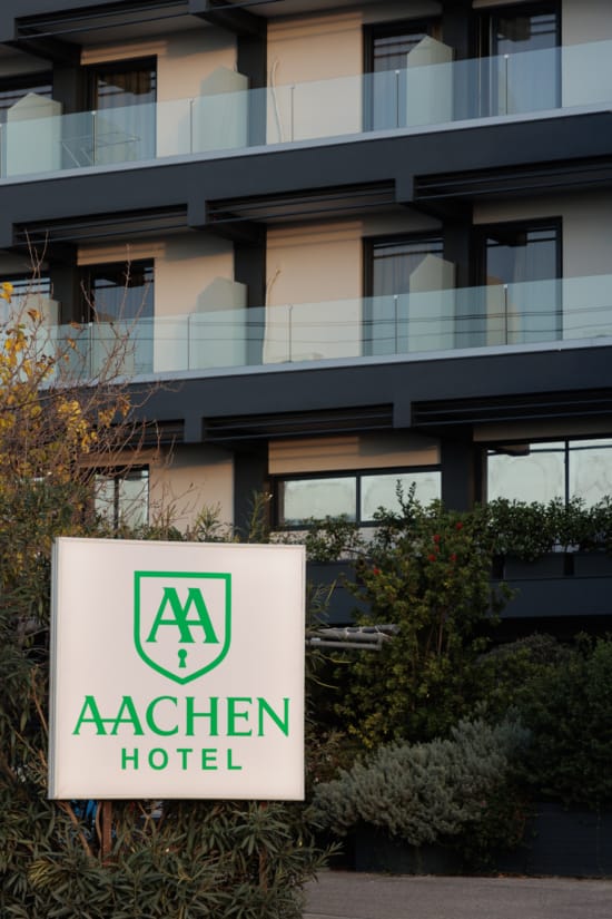 a sign in front of a building