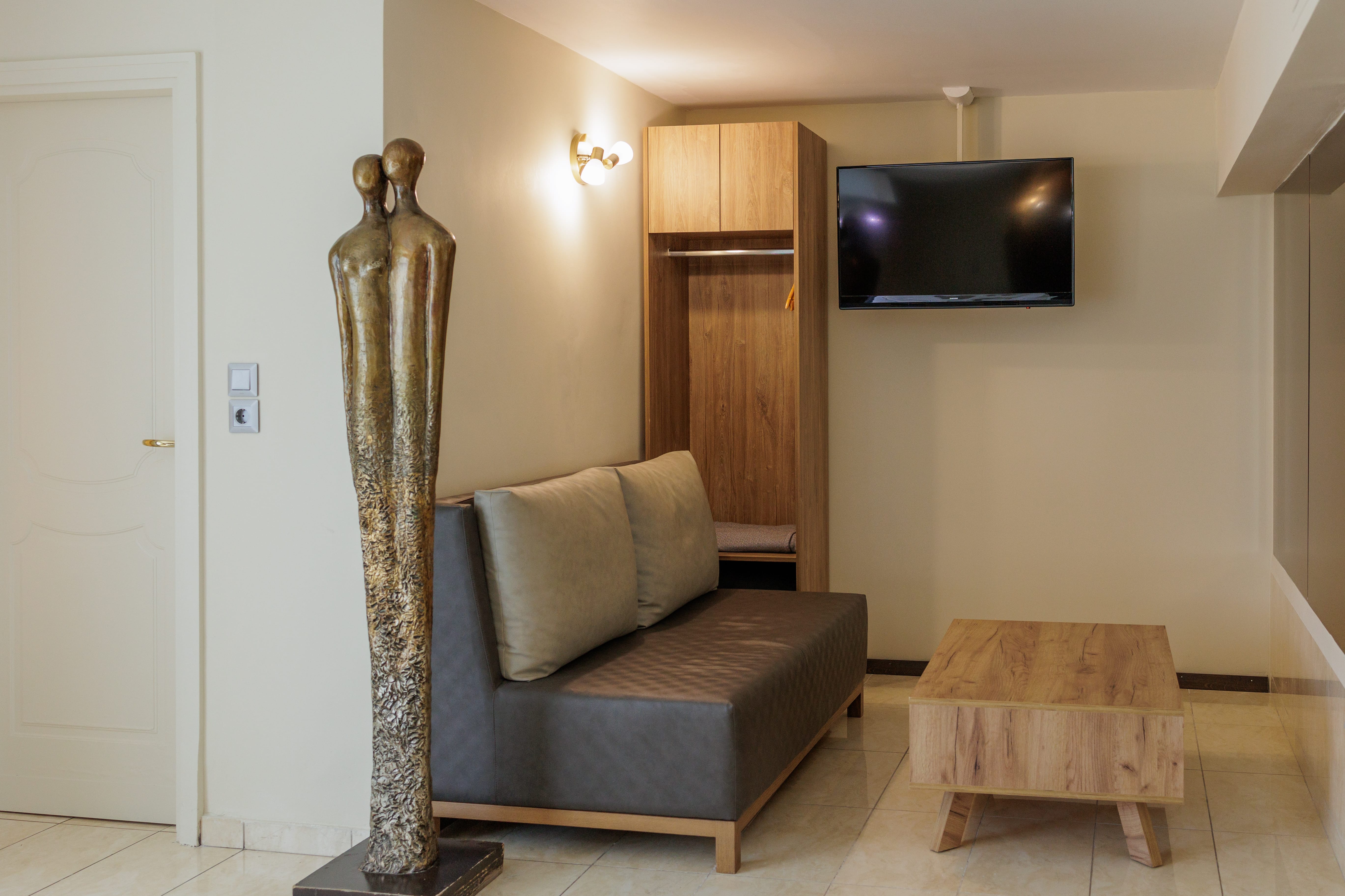 a living room with a tv and a couch