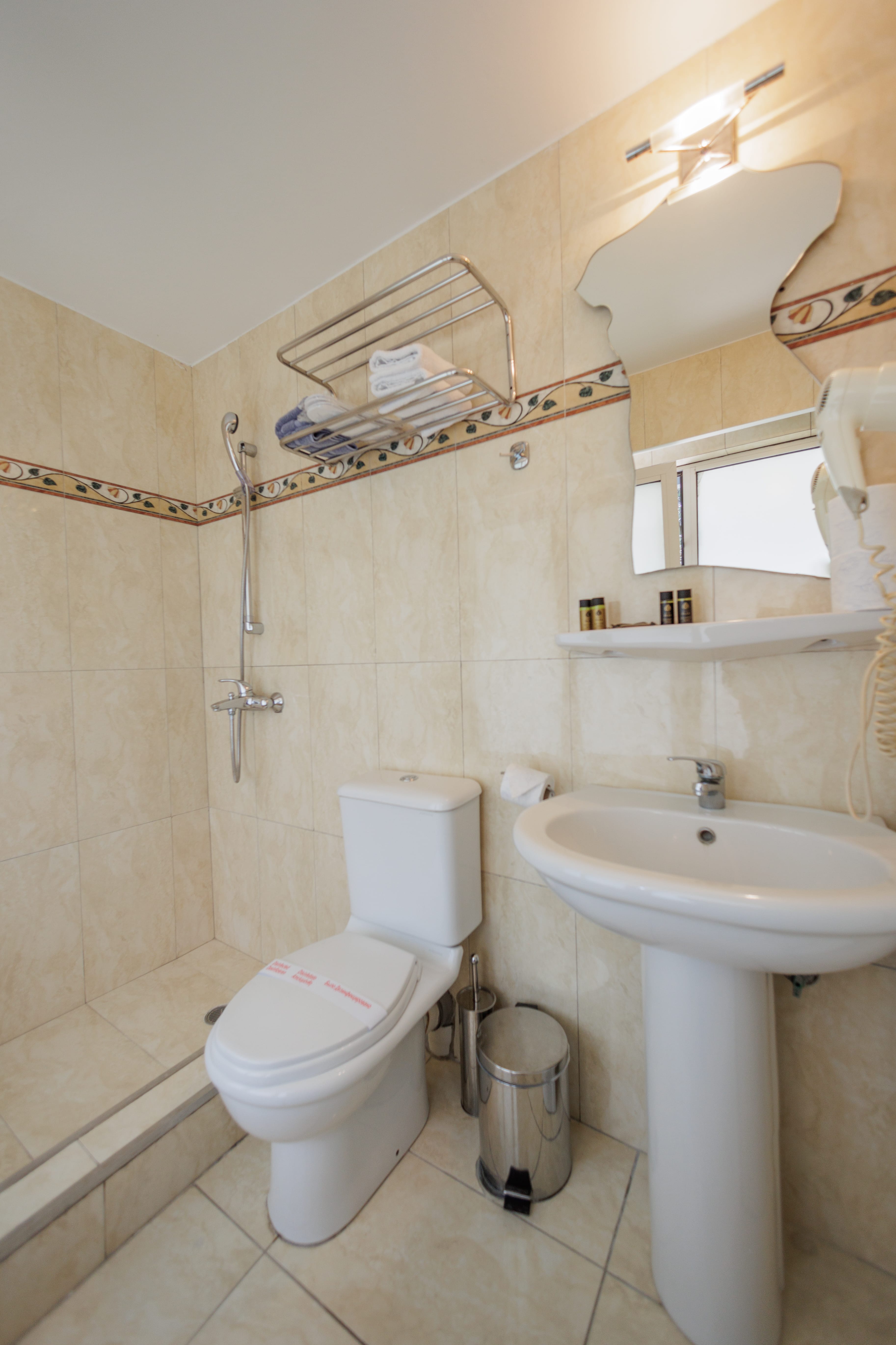 a bathroom with a sink and toilet