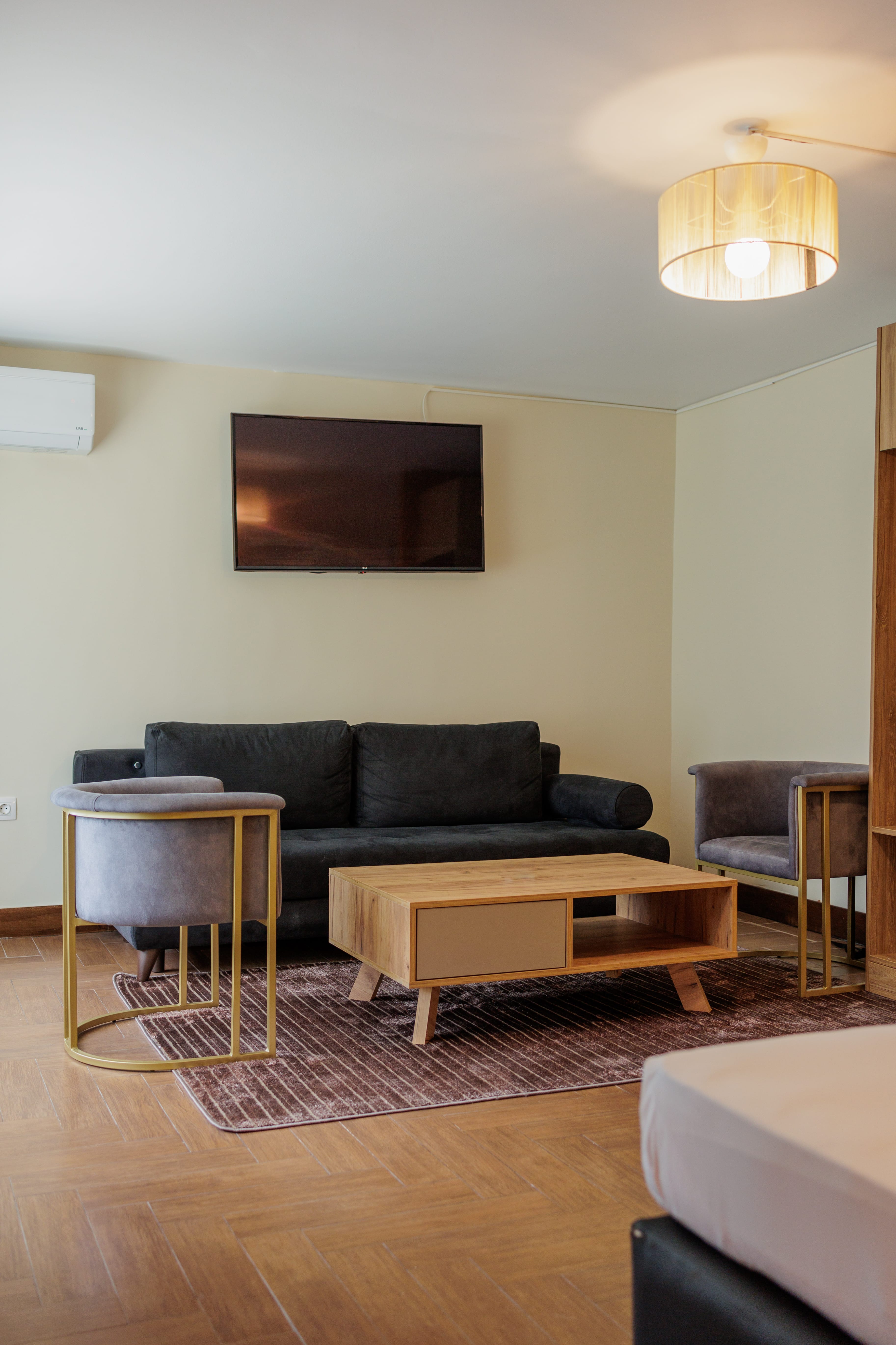 a living room with a couch and a table