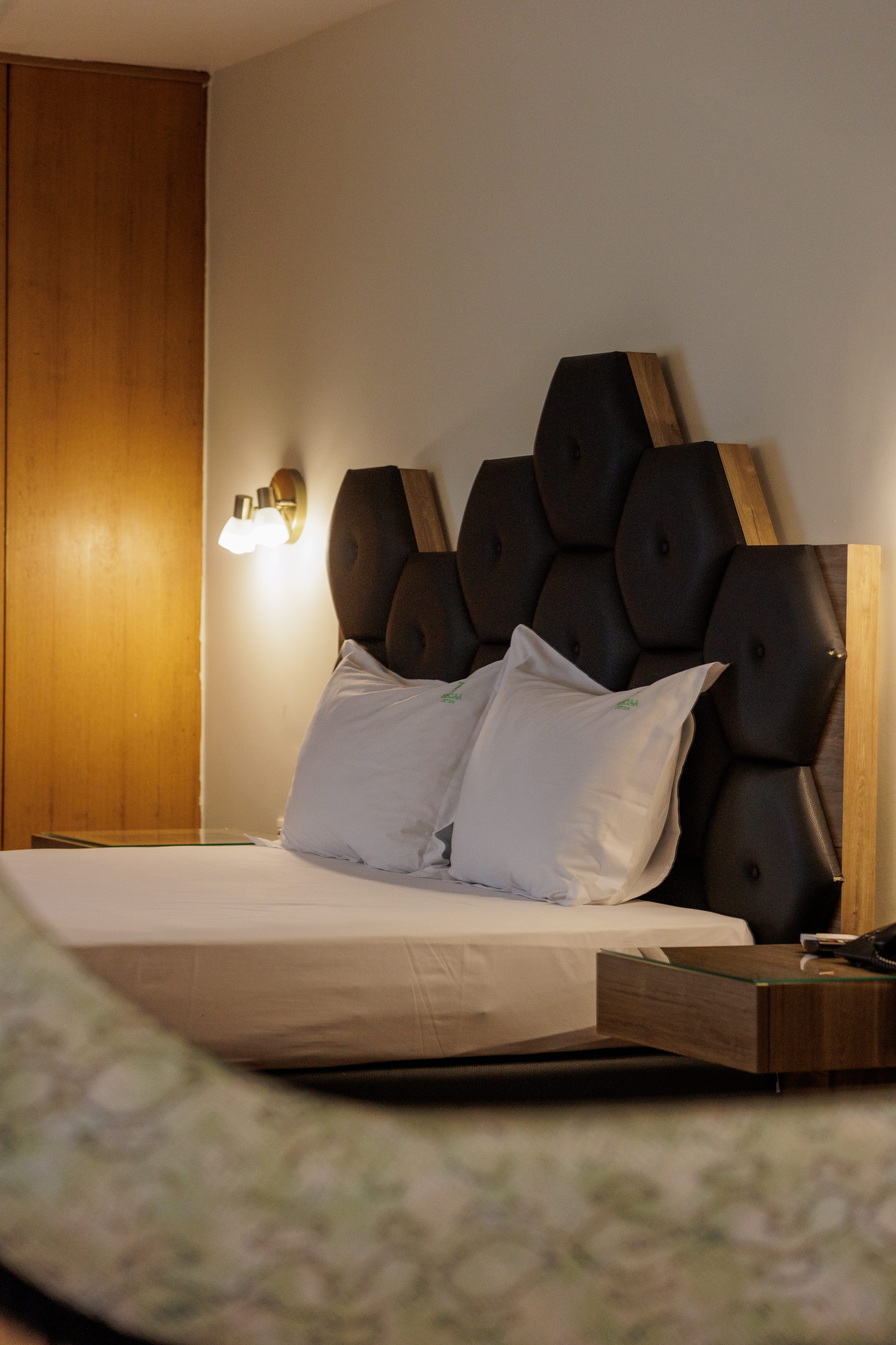 a bed with a box on it