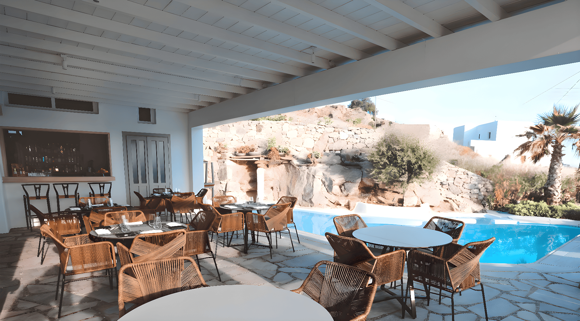 a pool with chairs around it