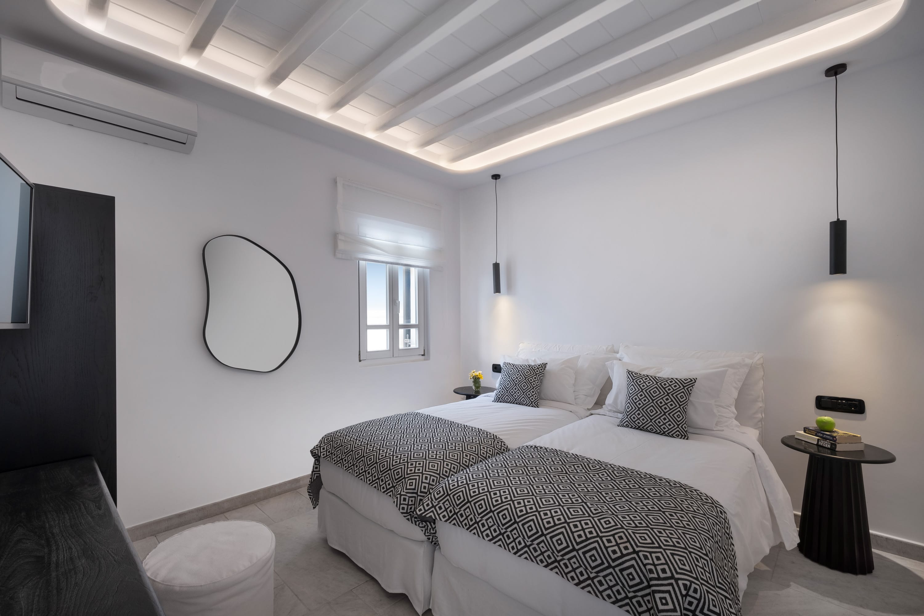 a bedroom with two beds