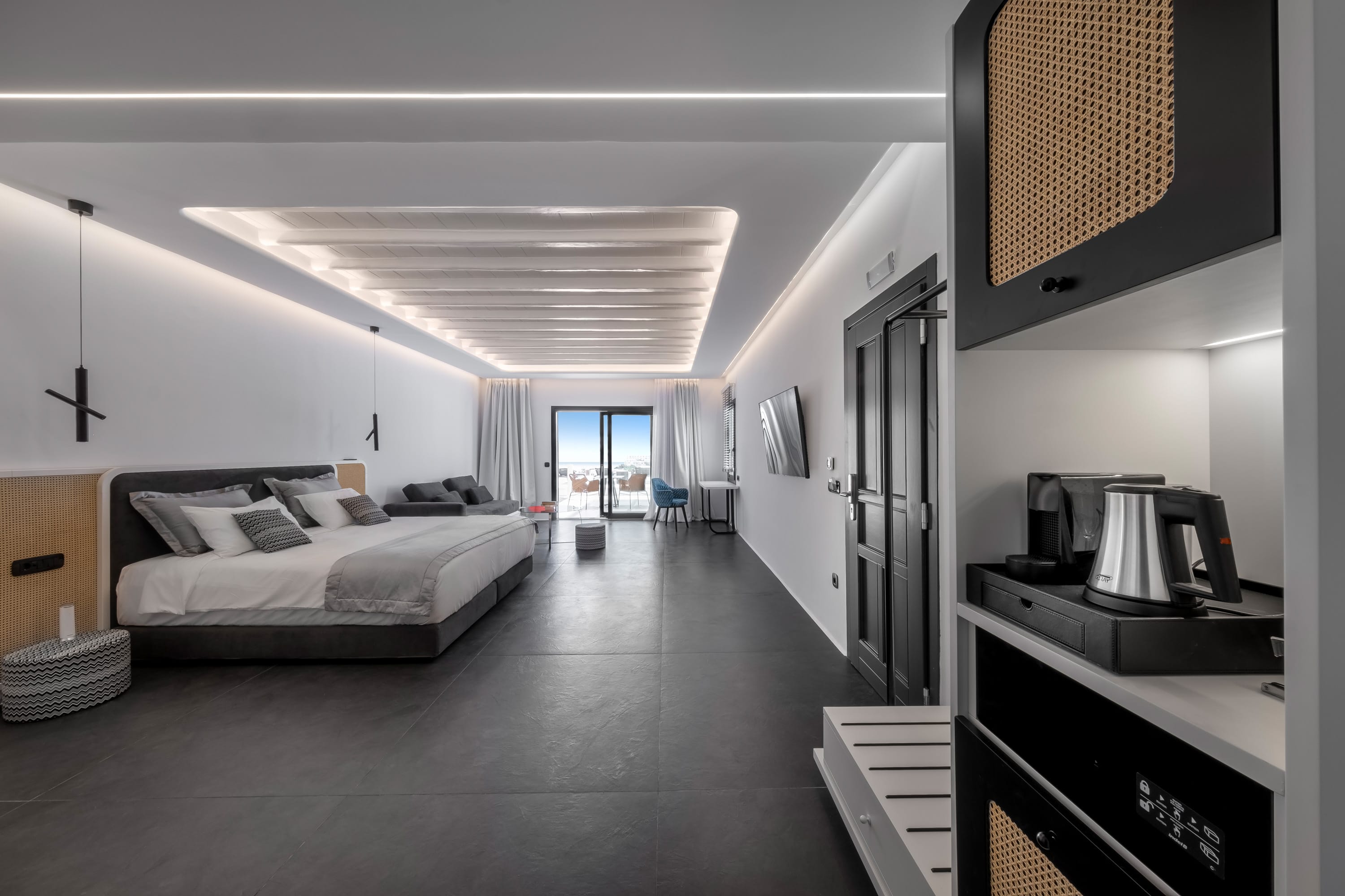 a bedroom with a bed and a desk