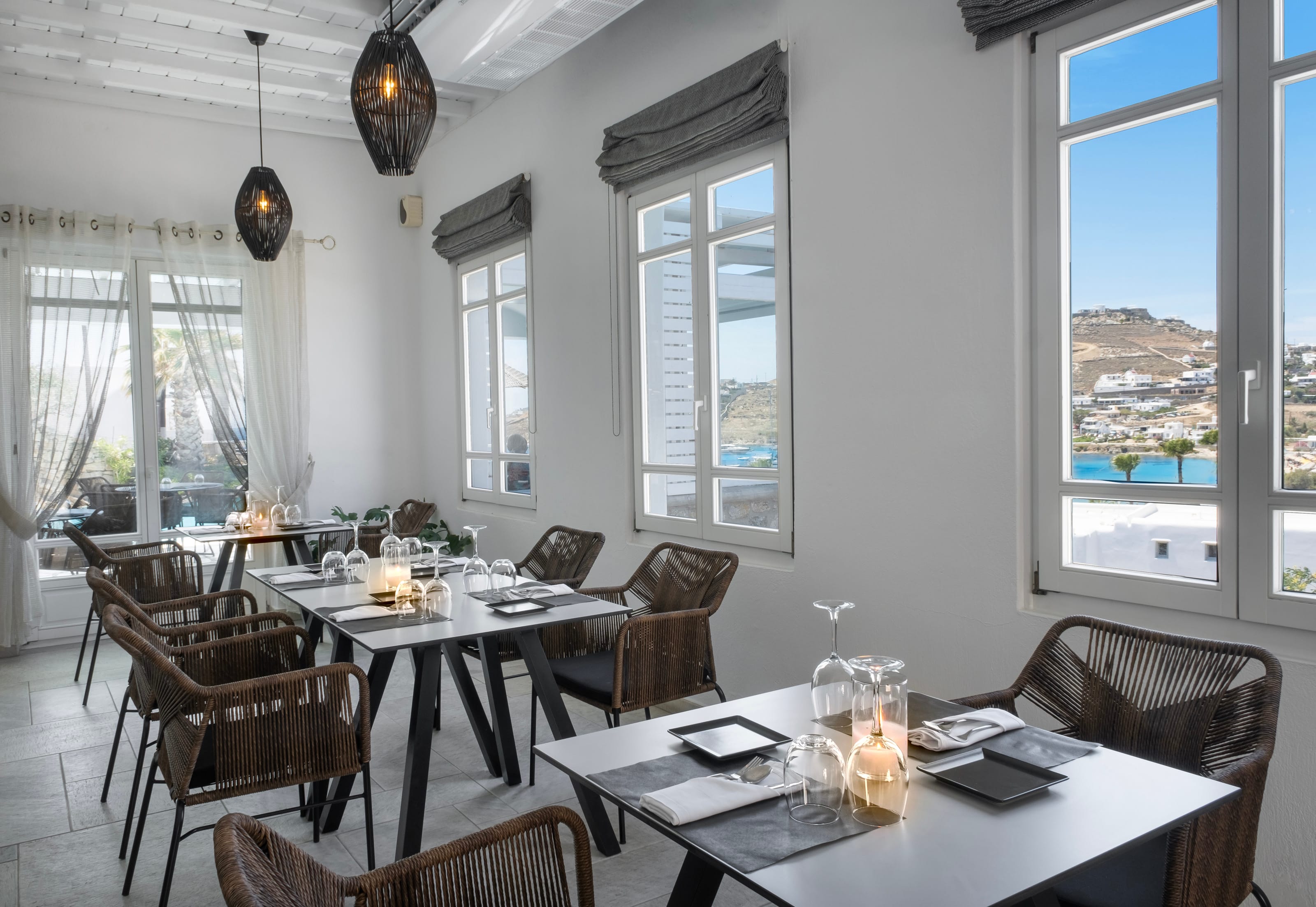 a dining room with a large window