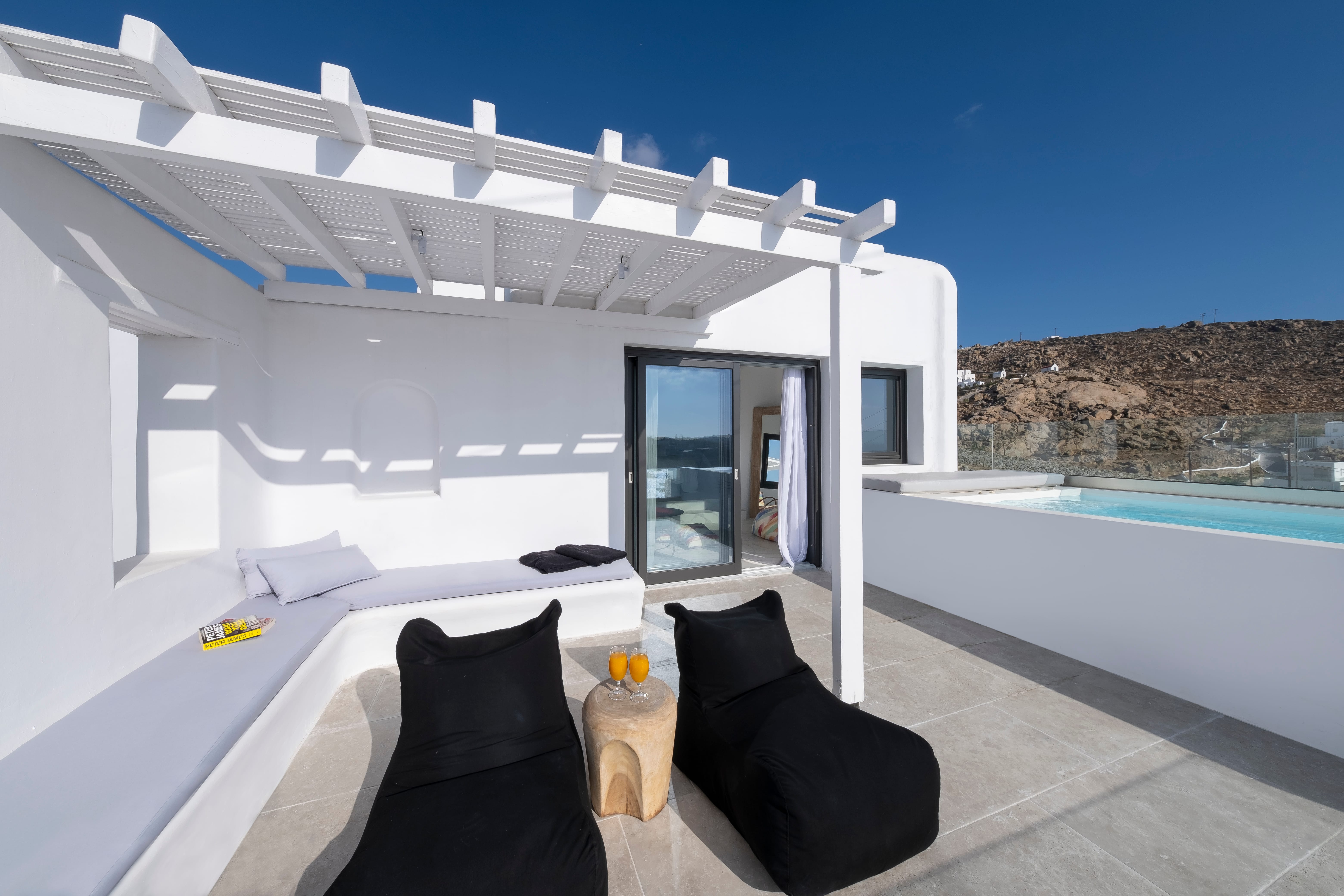 a white house with a pool