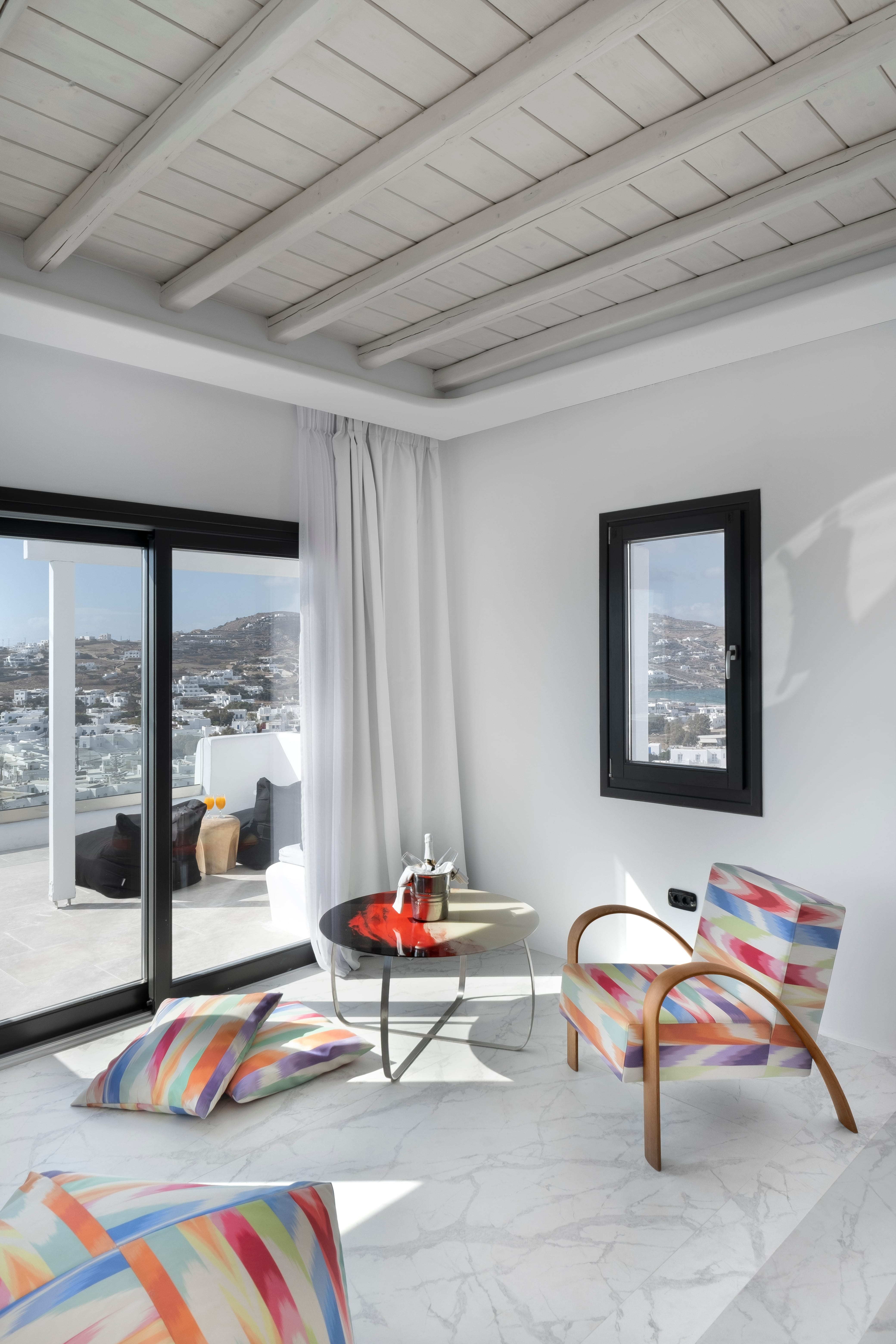 a room with a table and chairs