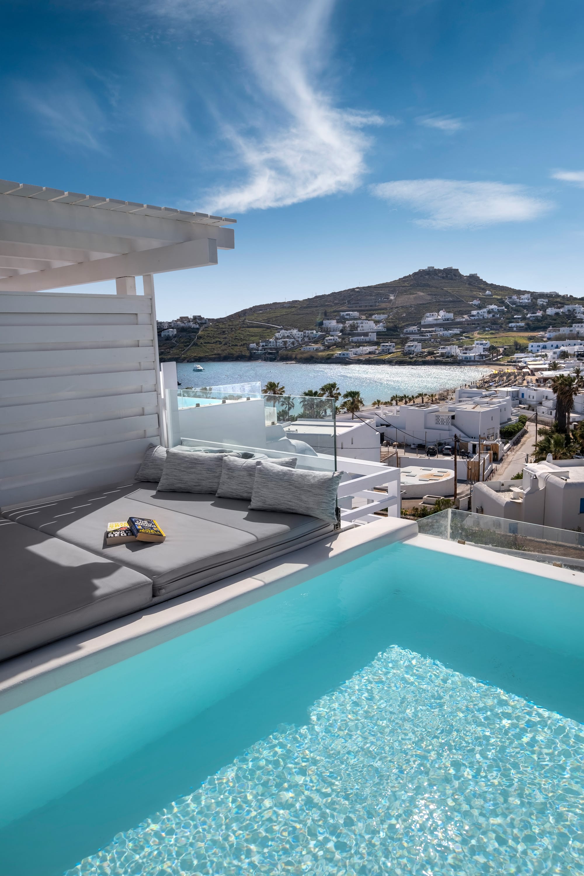 a pool with a building in the background
