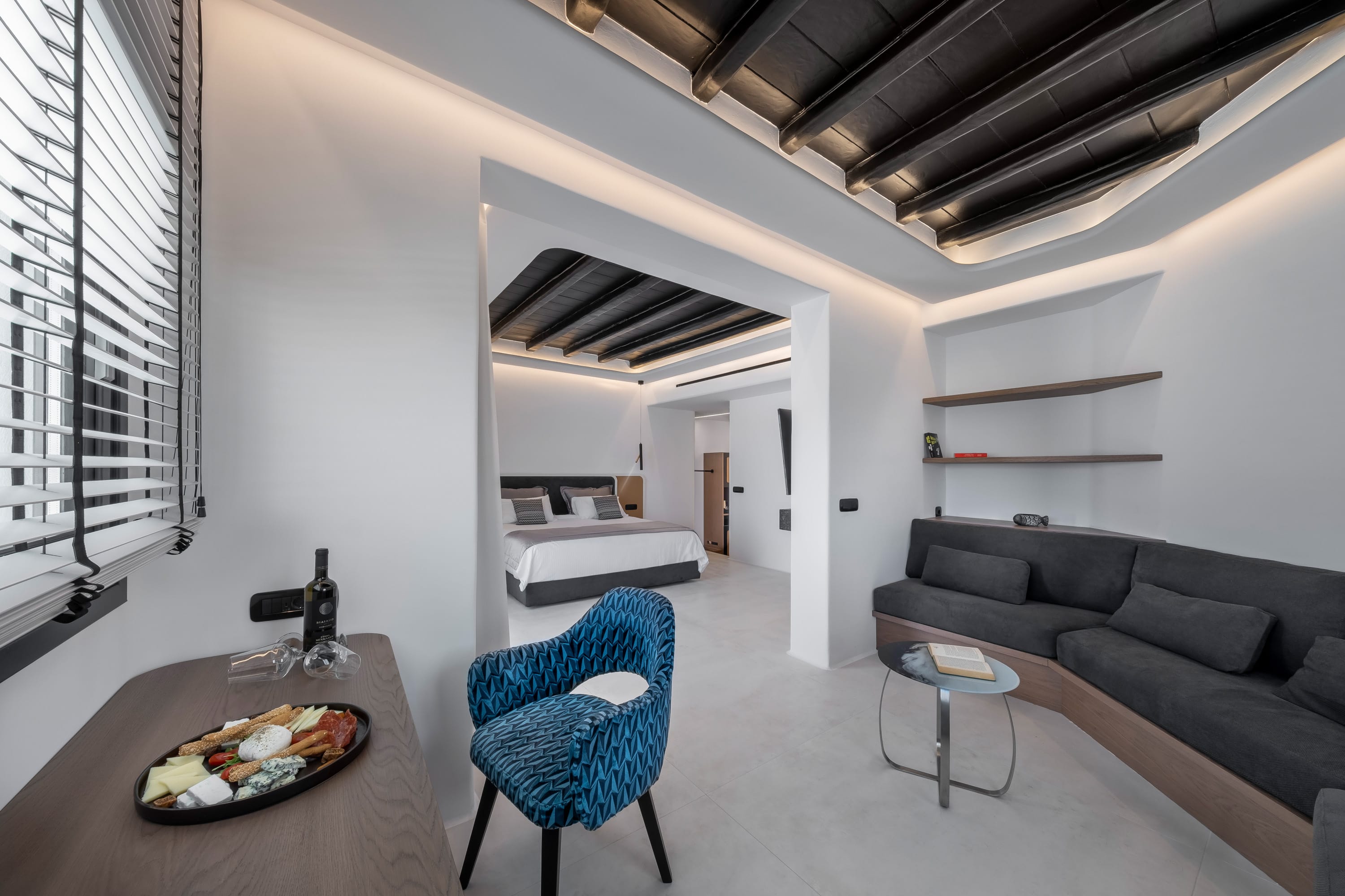 a living room with a couch and a table