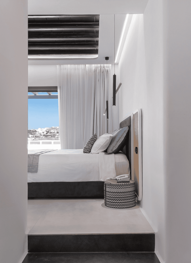 a bed with a basket on the side