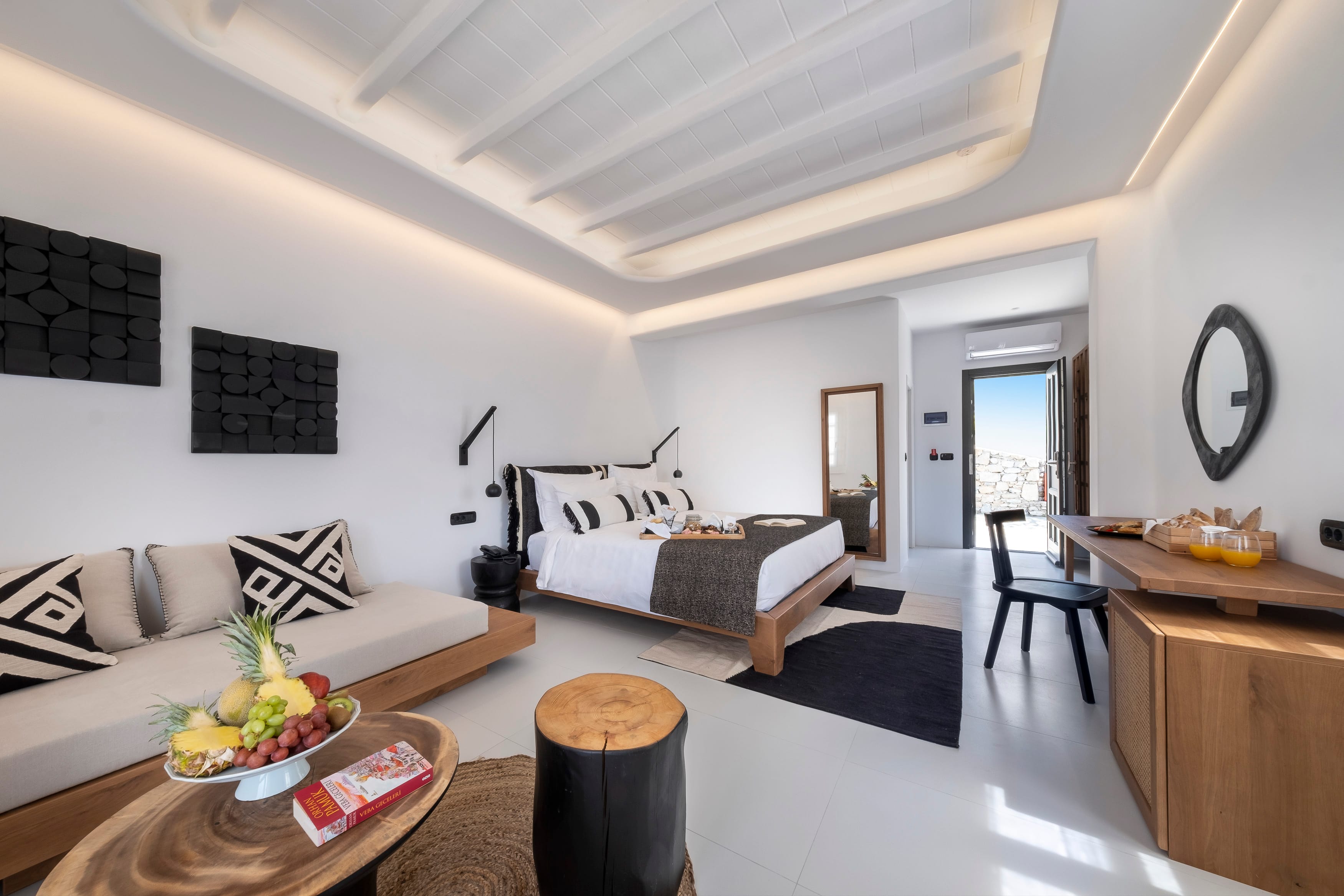 a living room with a couch and a table