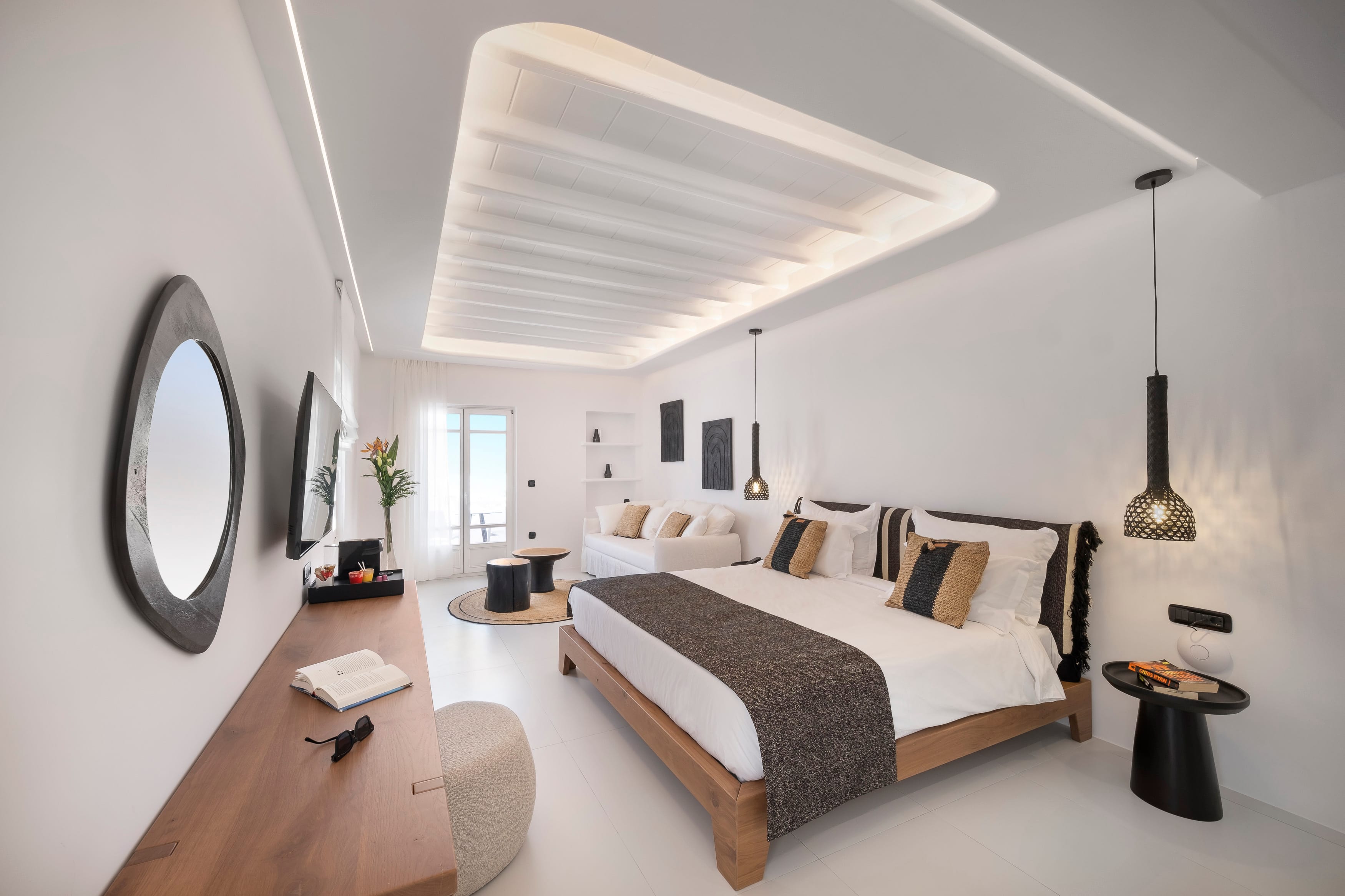 a bedroom with a bed and a desk