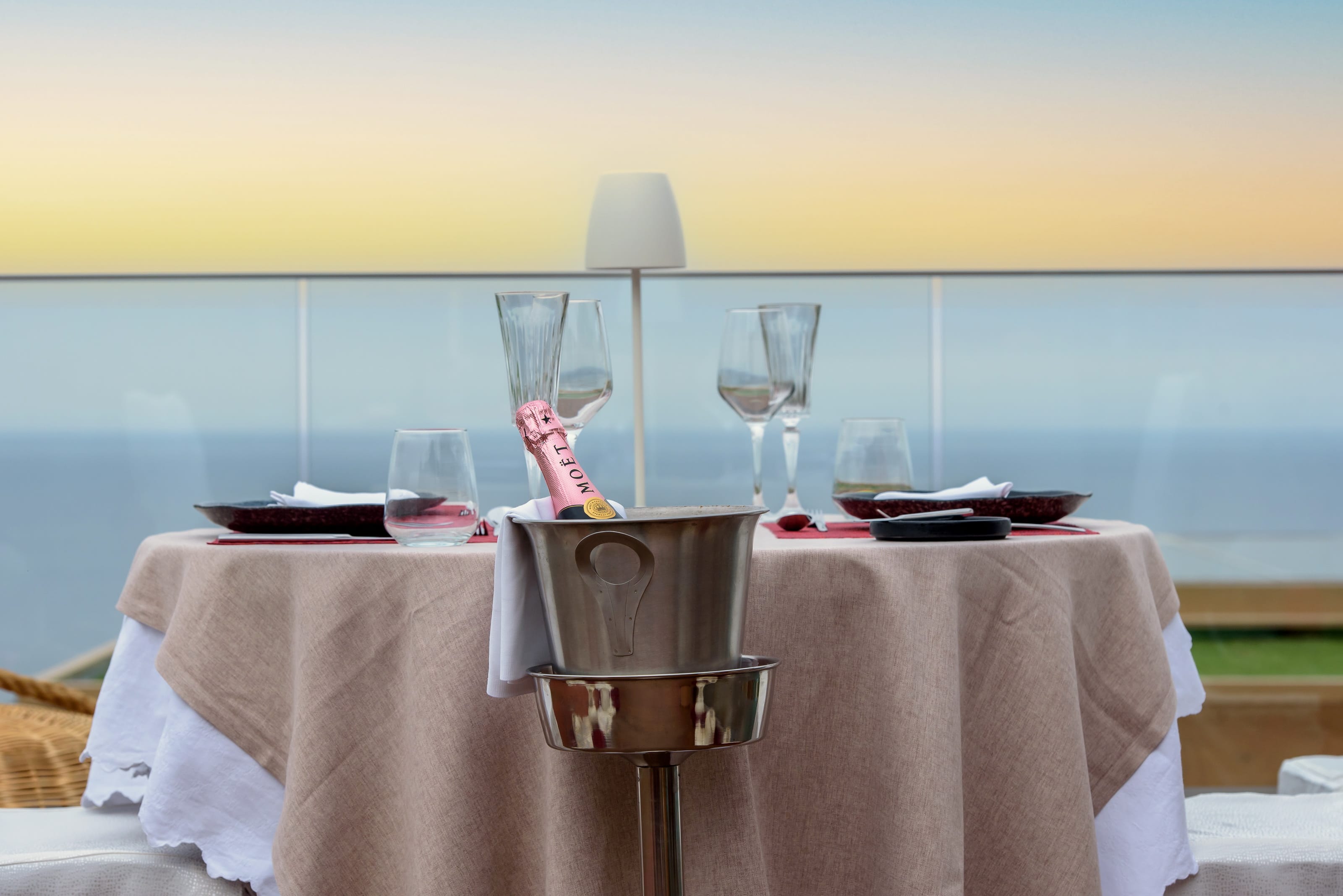 a table with wine glasses on it