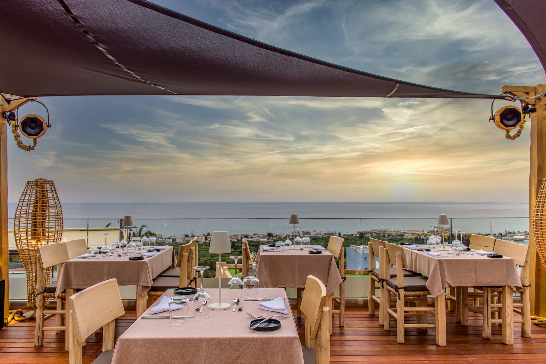 tables and chairs on a deck