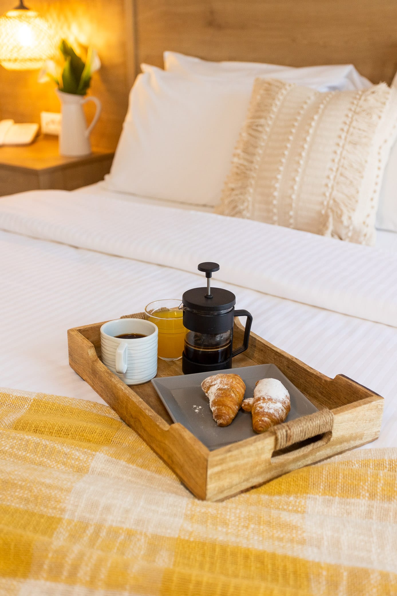 a tray of cookies on a bed