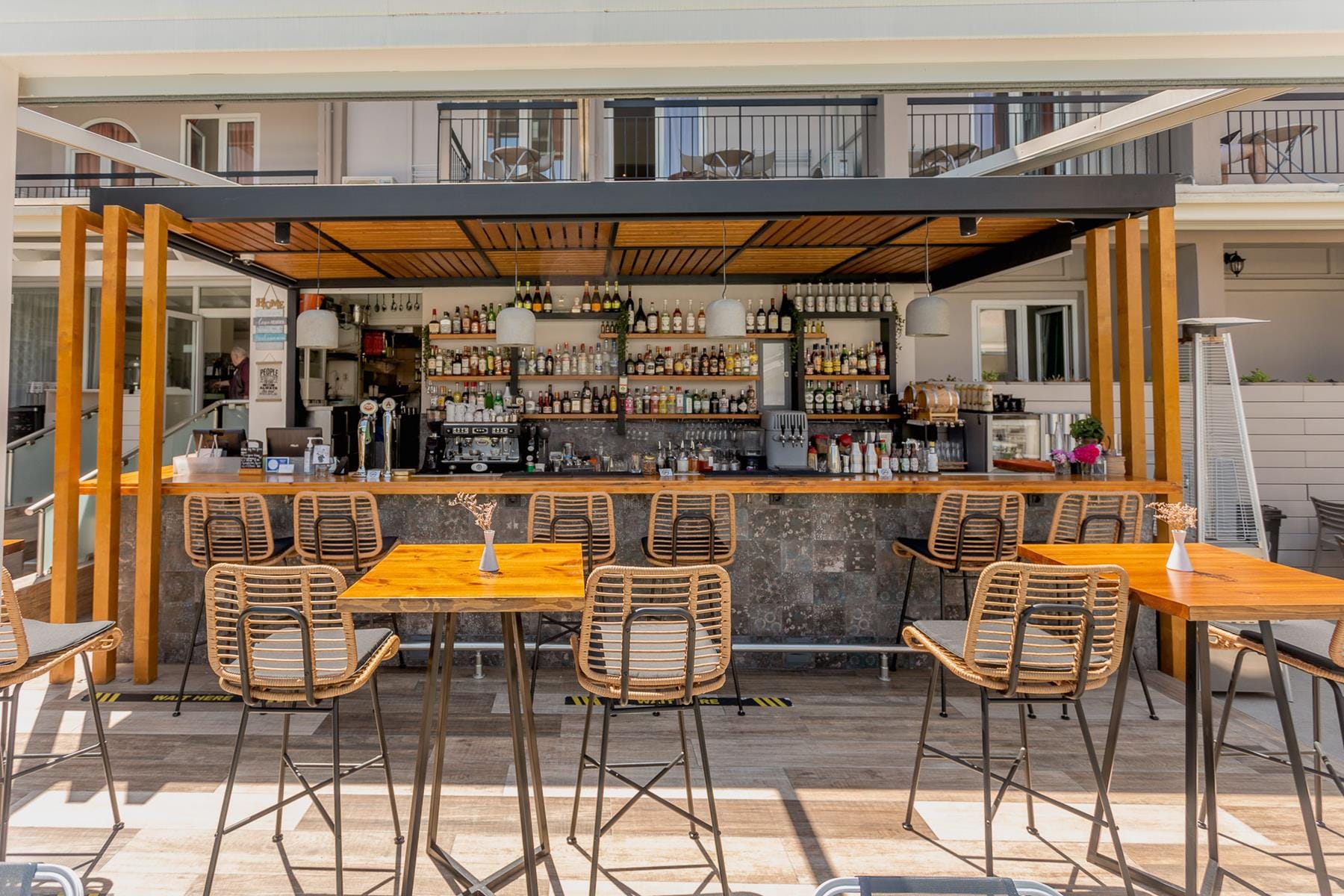 a group of tables and chairs outside