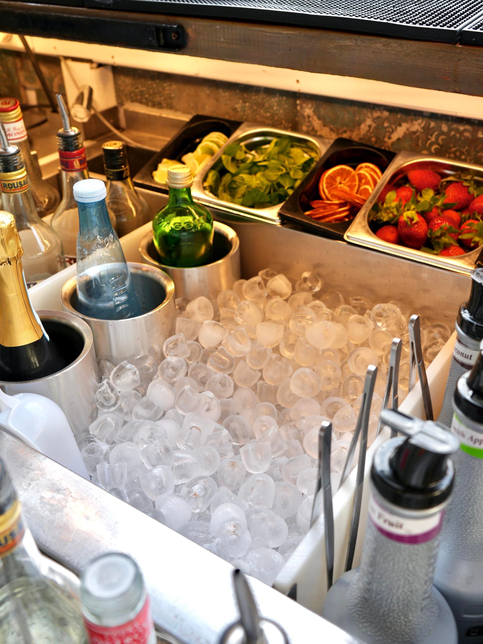 a kitchen counter with food and utensils