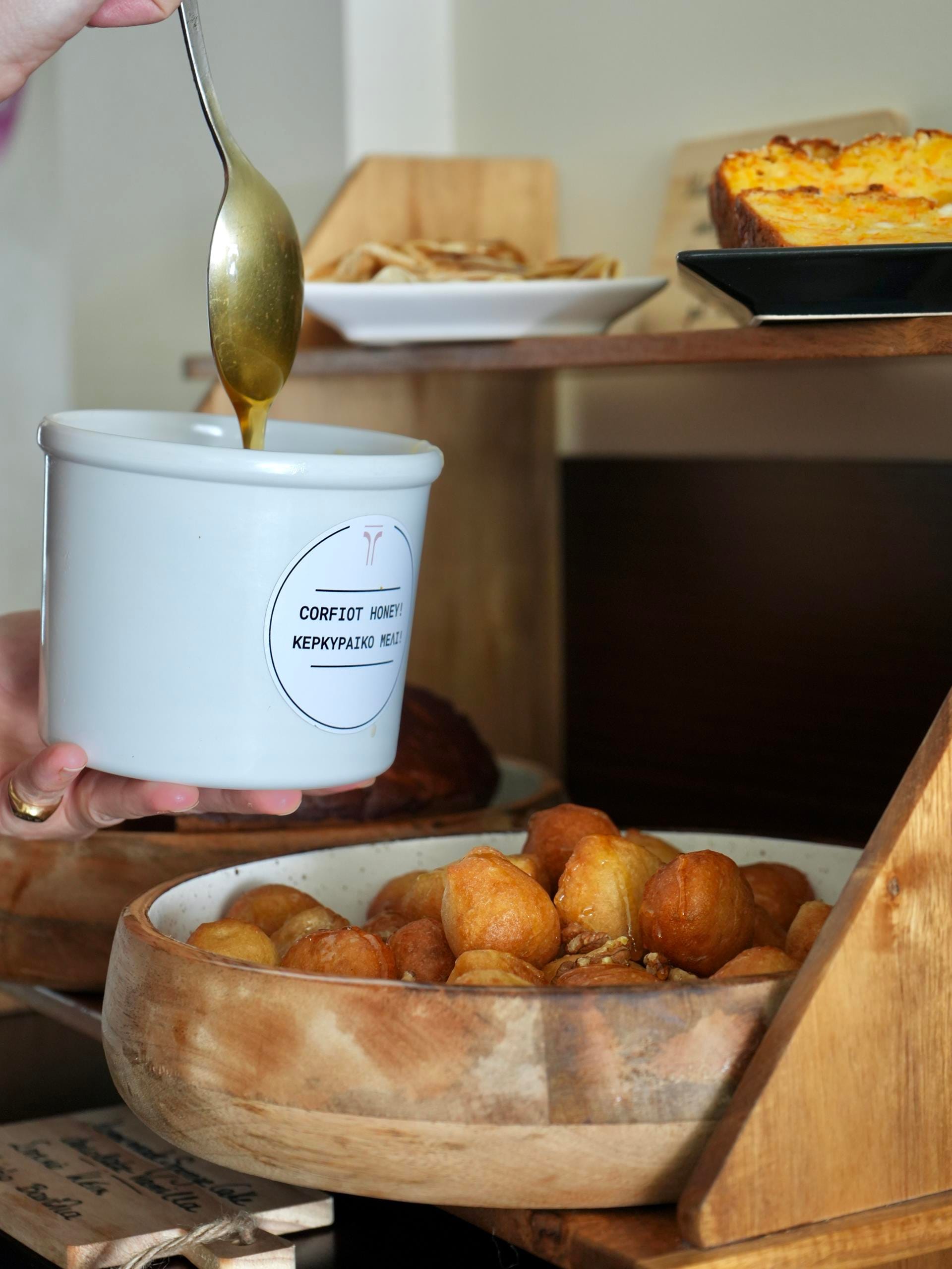 a bowl of potatoes and a spoon