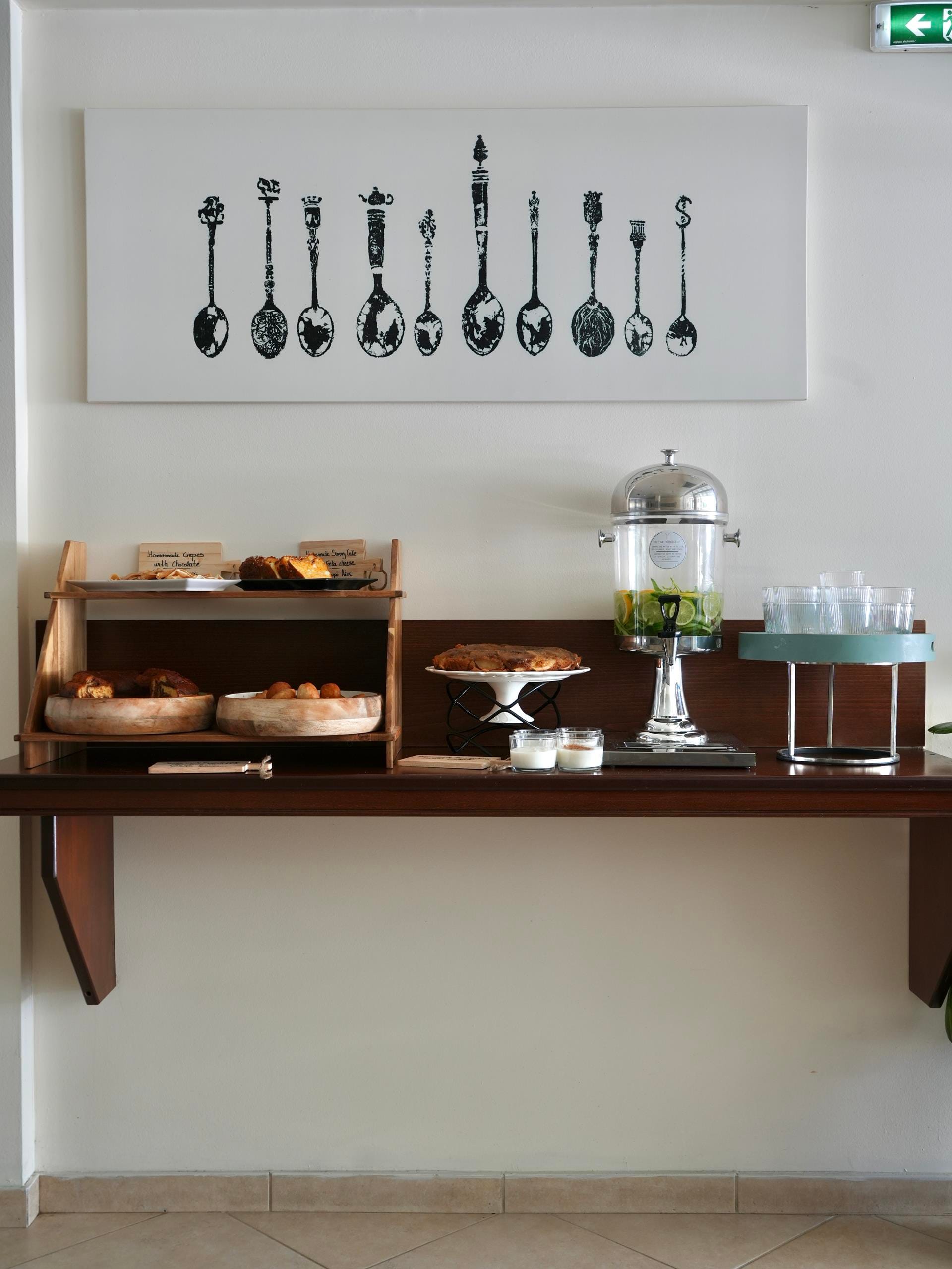 a kitchen counter with a white sign above it