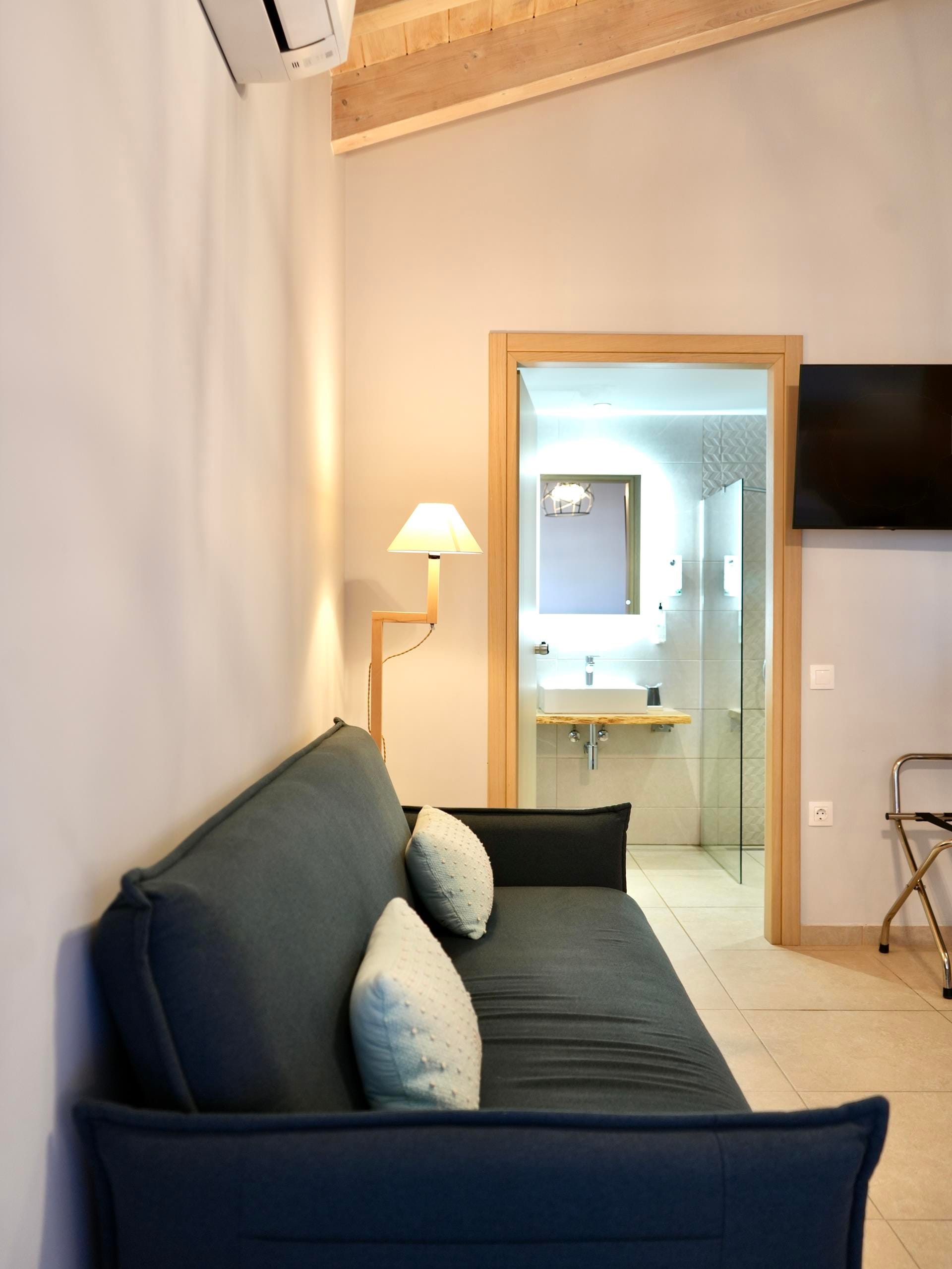 a living room with a large mirror