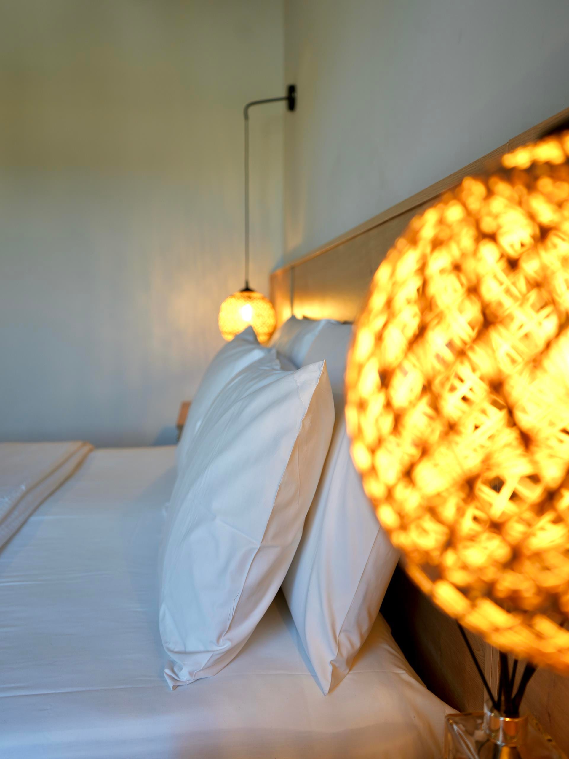 a lamp on a bed
