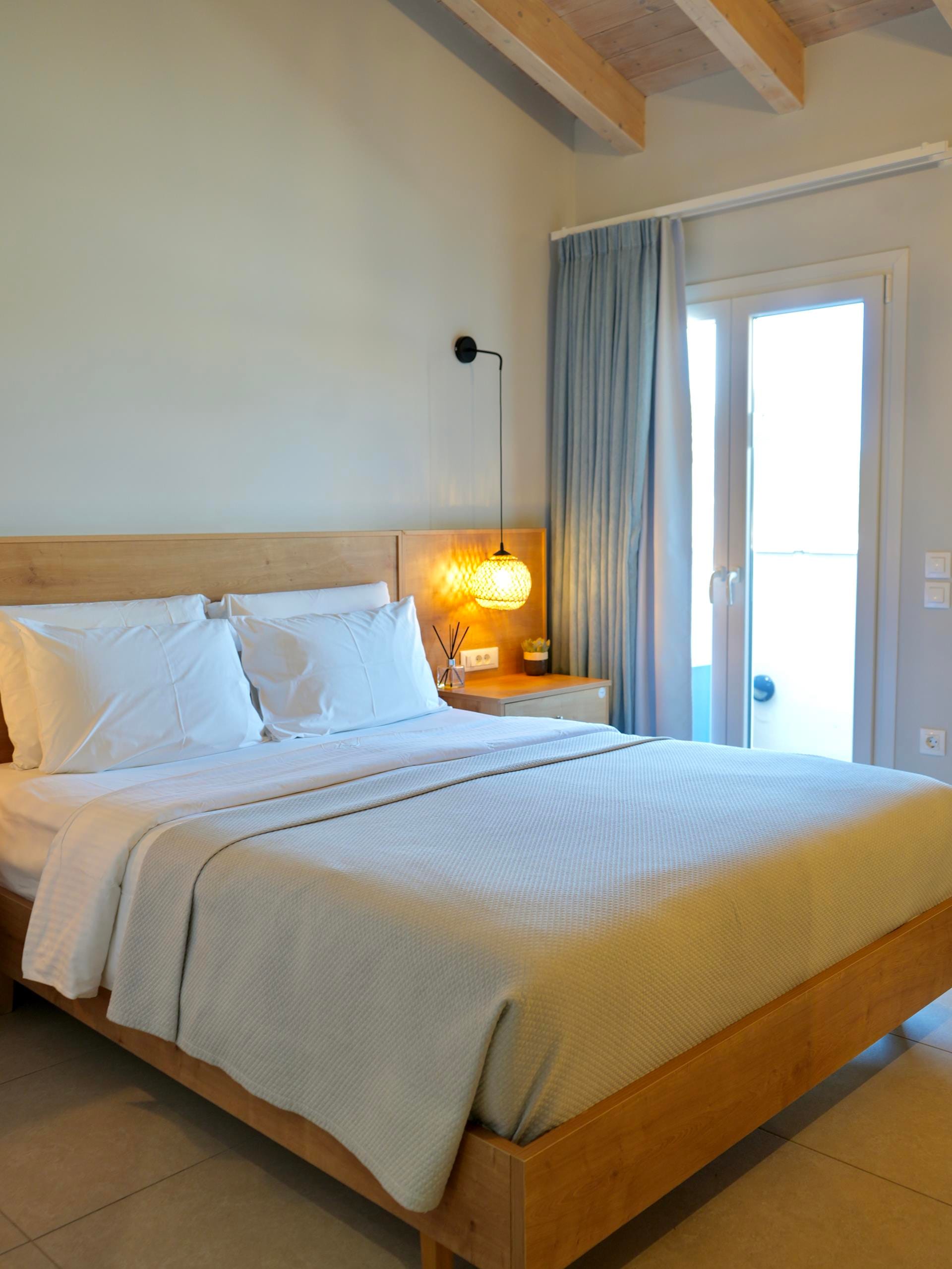 a bed with a white bed spread