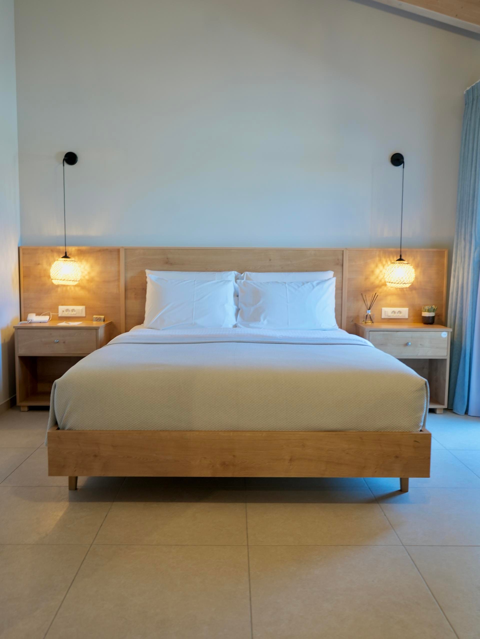 a bed with a wooden headboard
