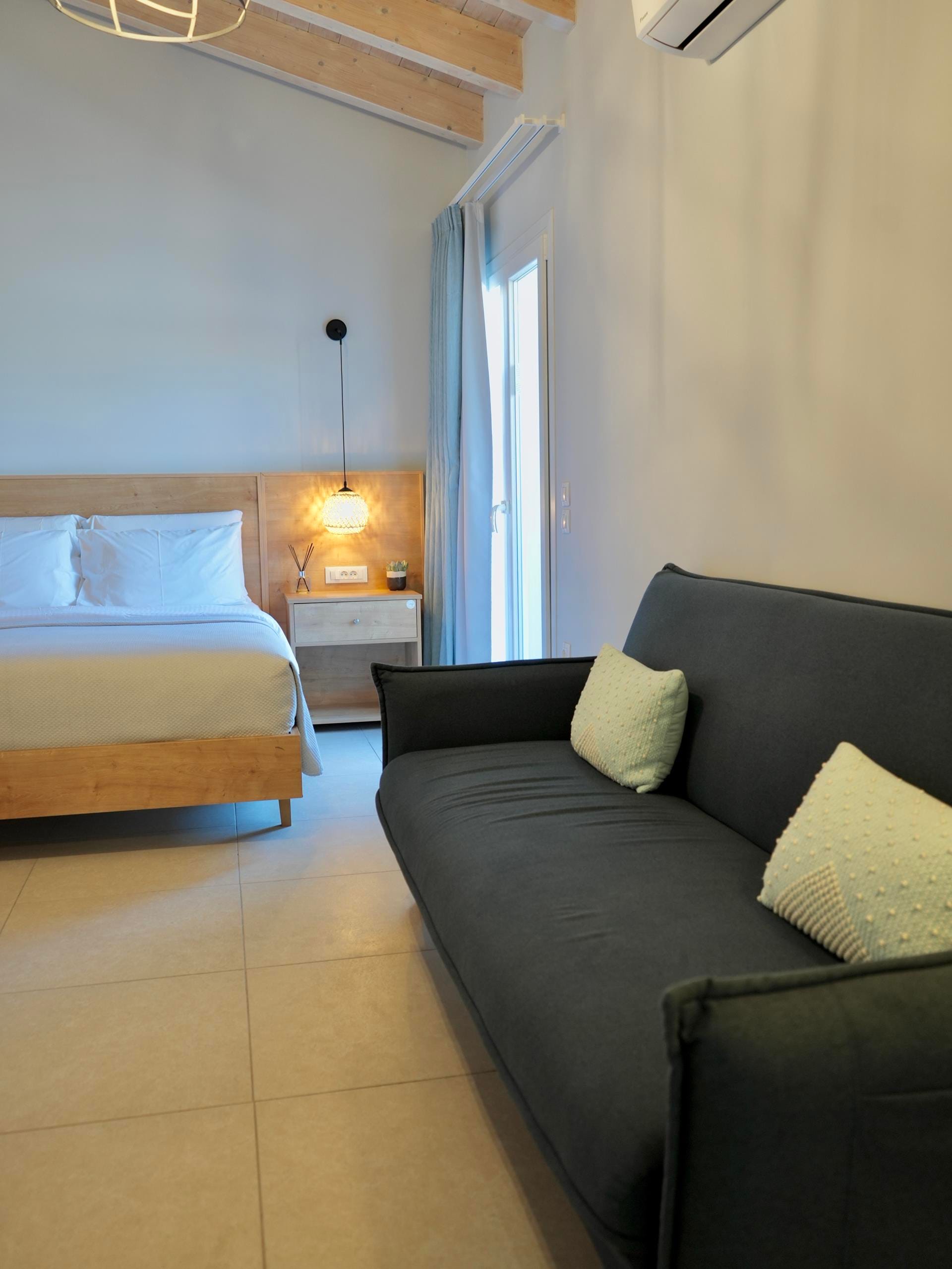 a room with a couch and a bed