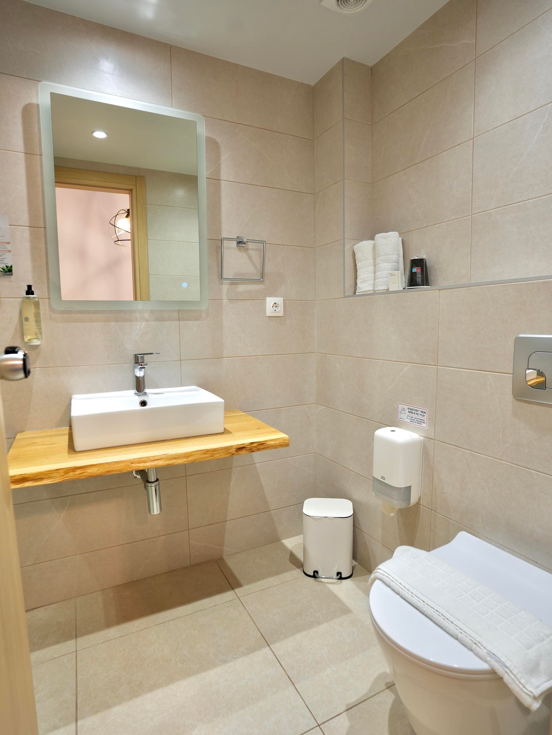 a bathroom with a sink and mirror