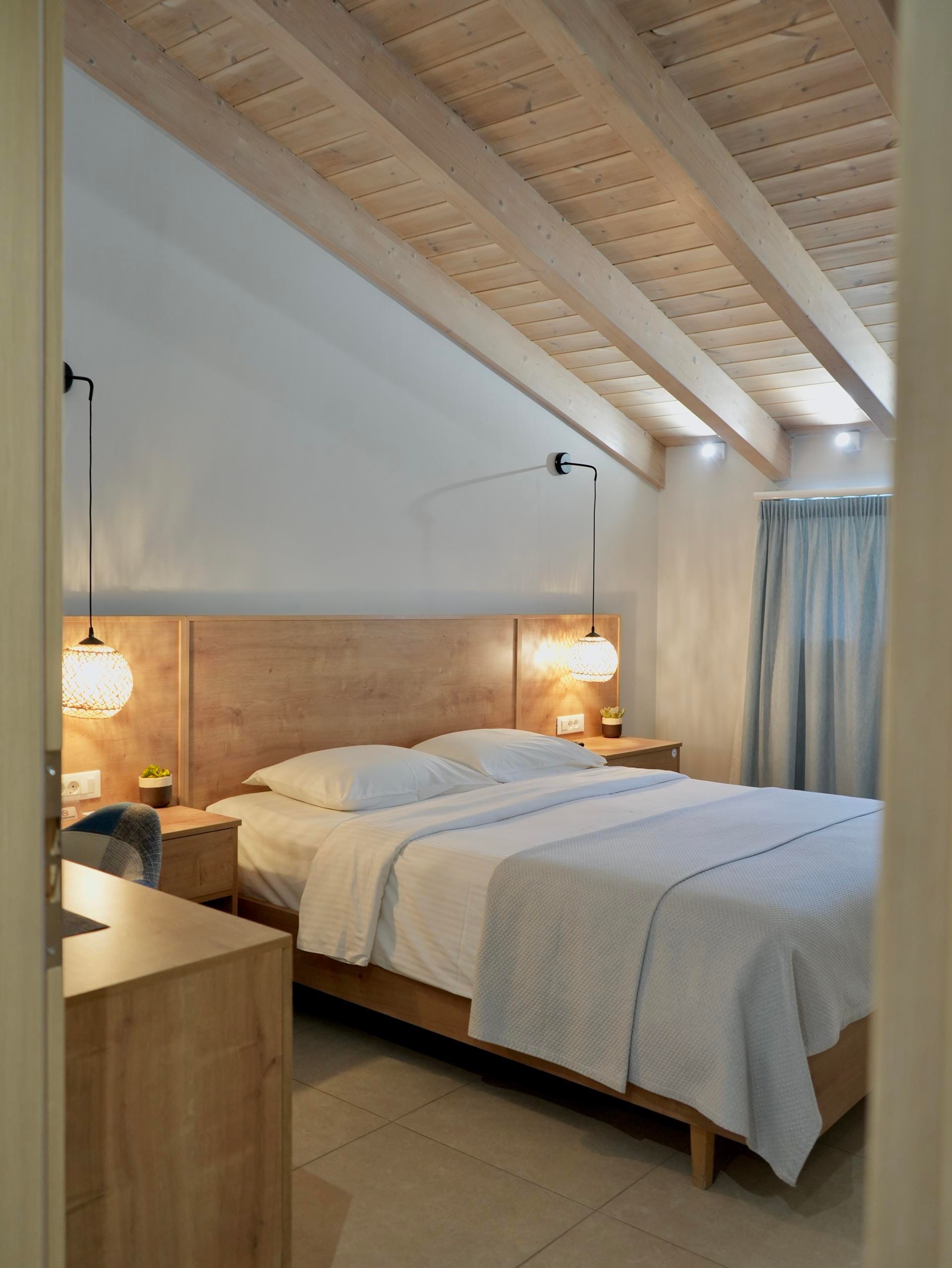 a couple of beds in a room