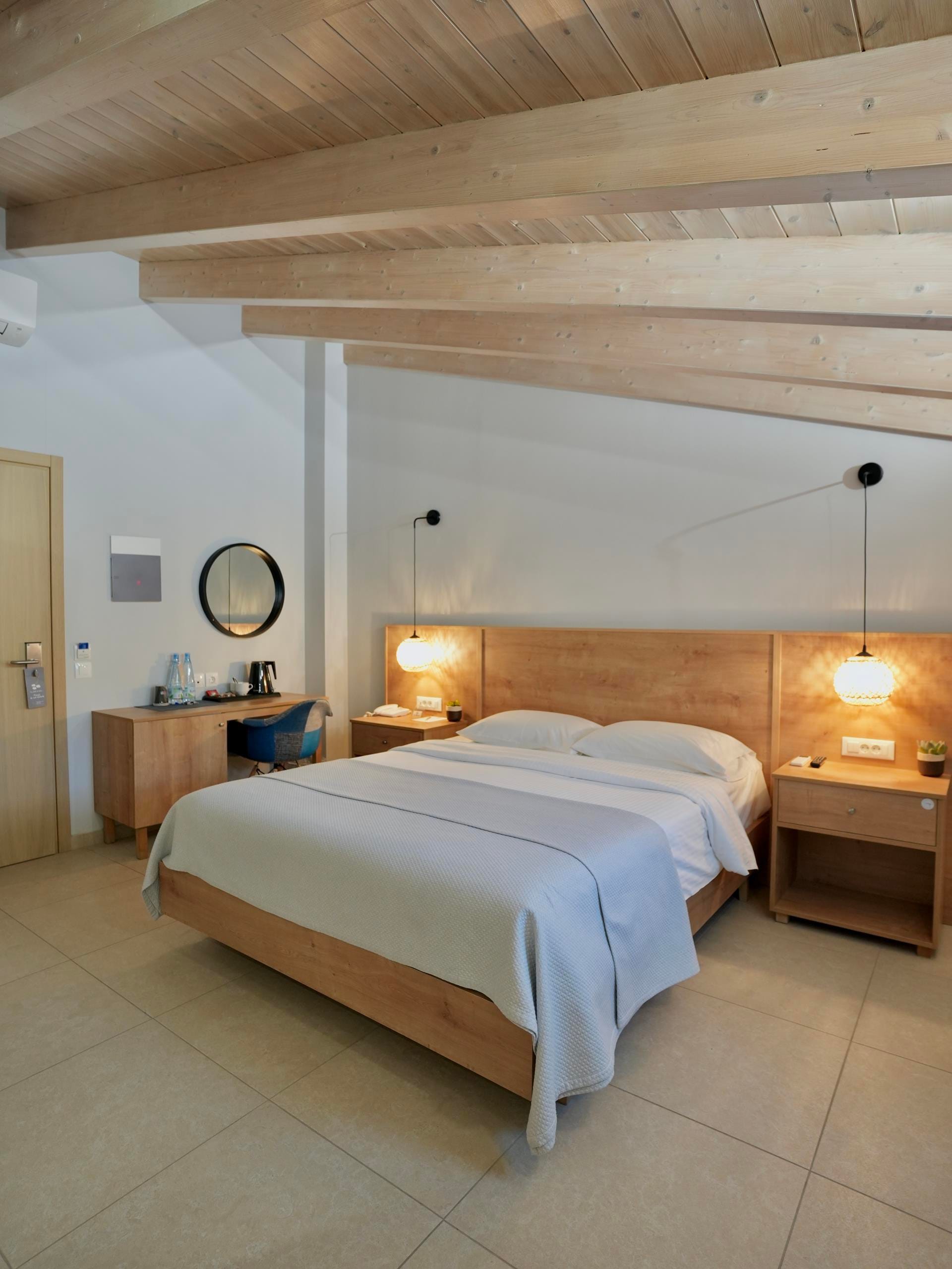 a couple of beds in a room