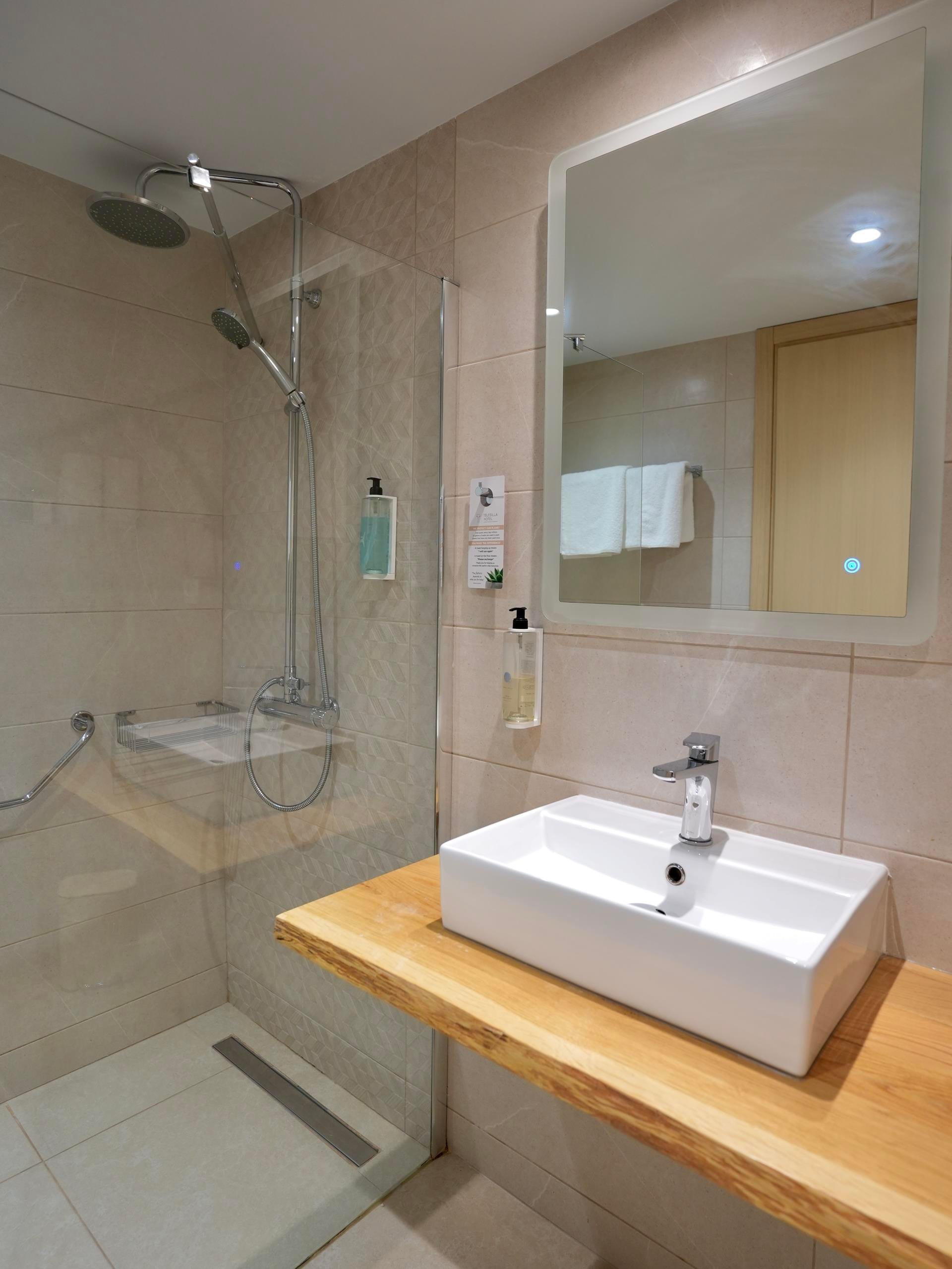 a bathroom with a glass shower