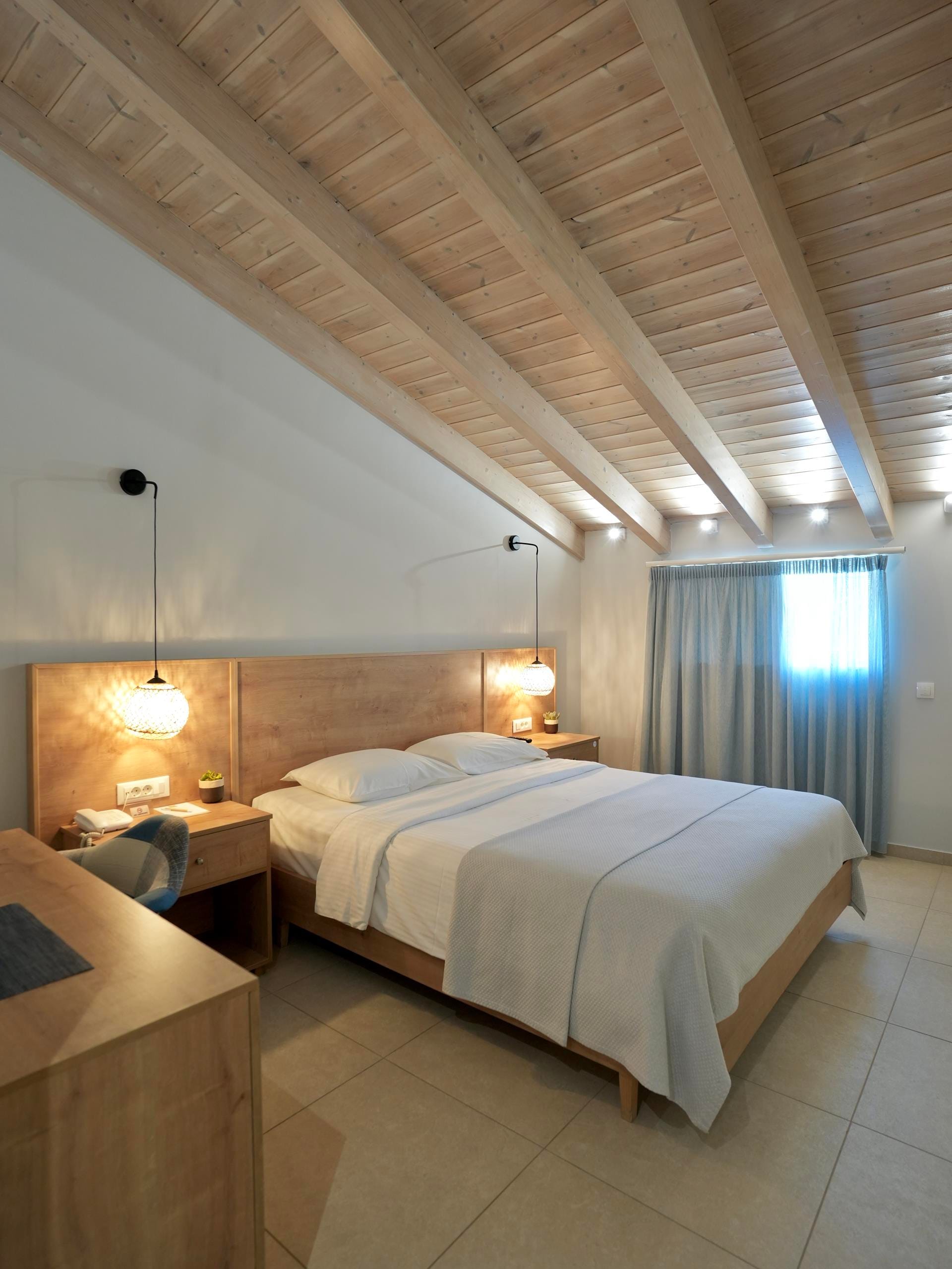 a hotel room with two beds