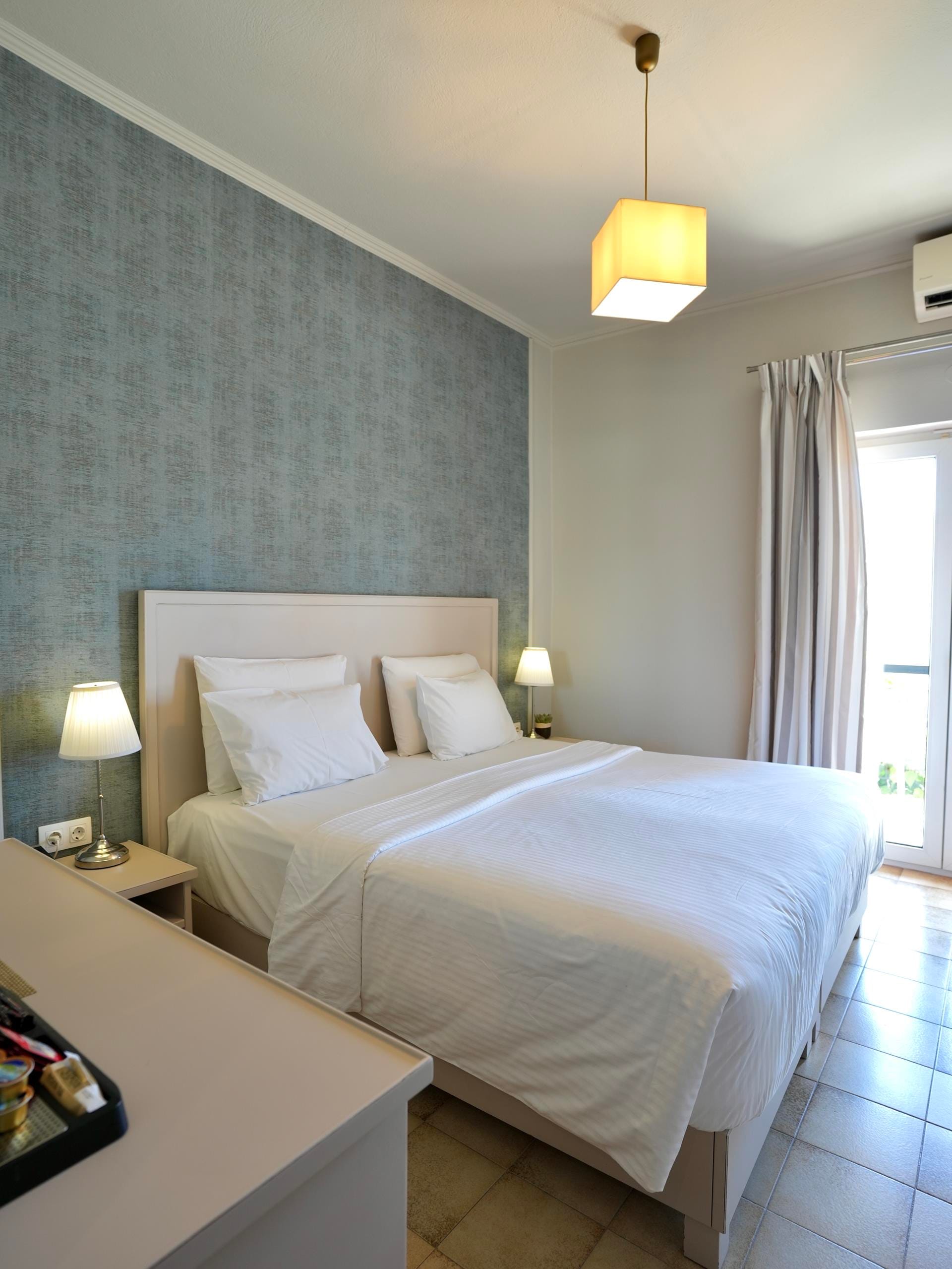 a bed with a white bed spread