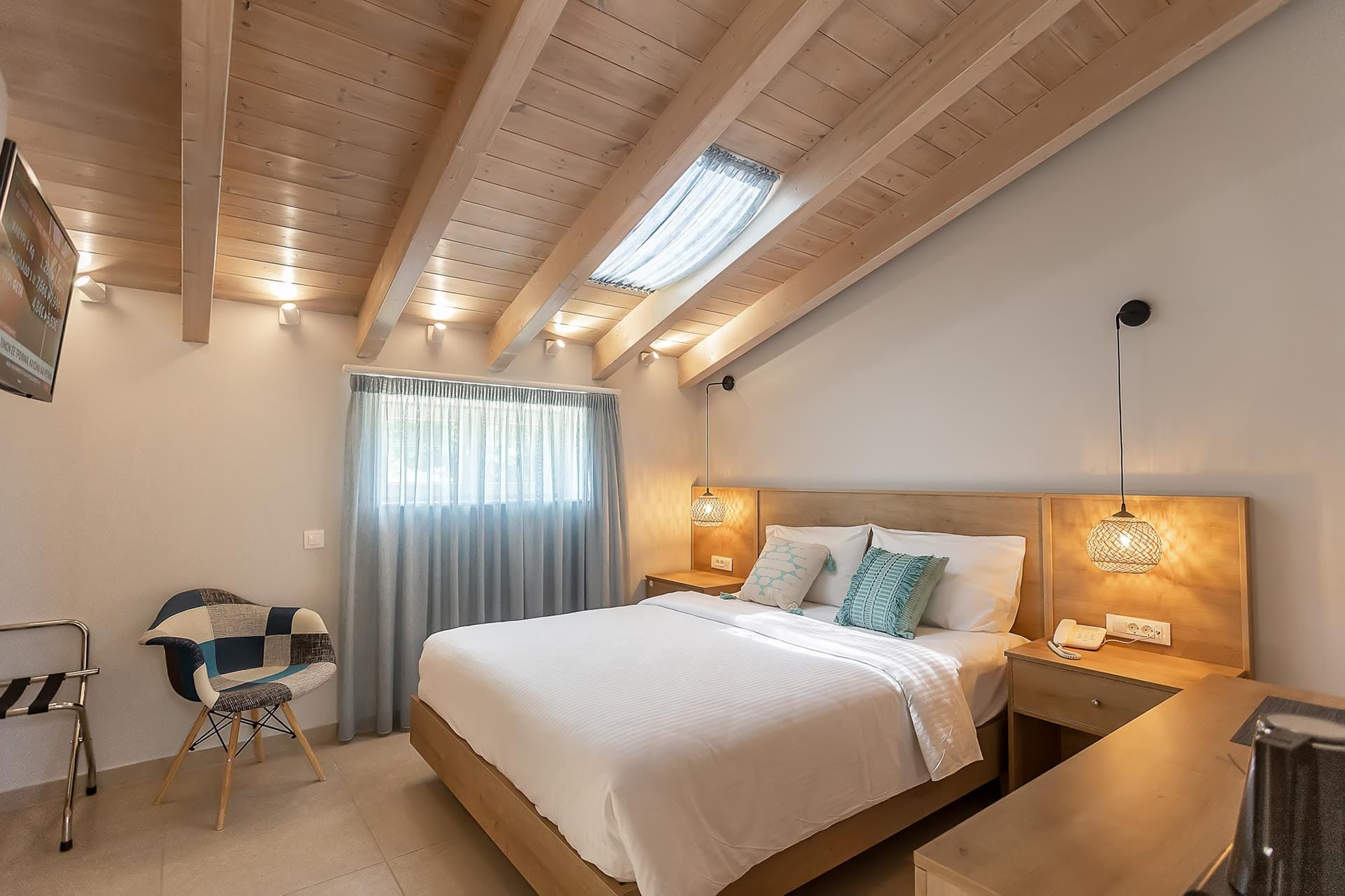 a bedroom with a bed and desk