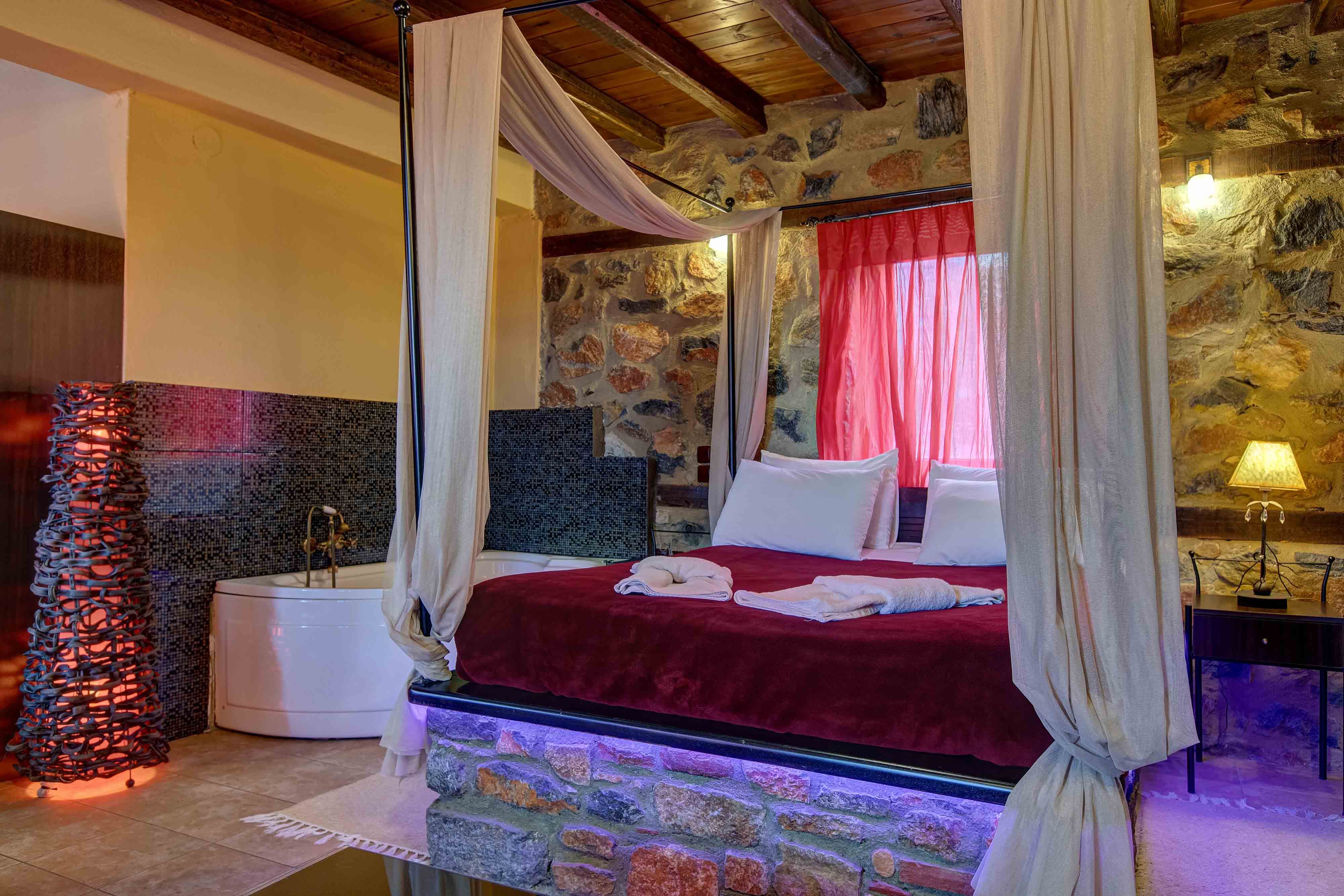 a bedroom with a red bed