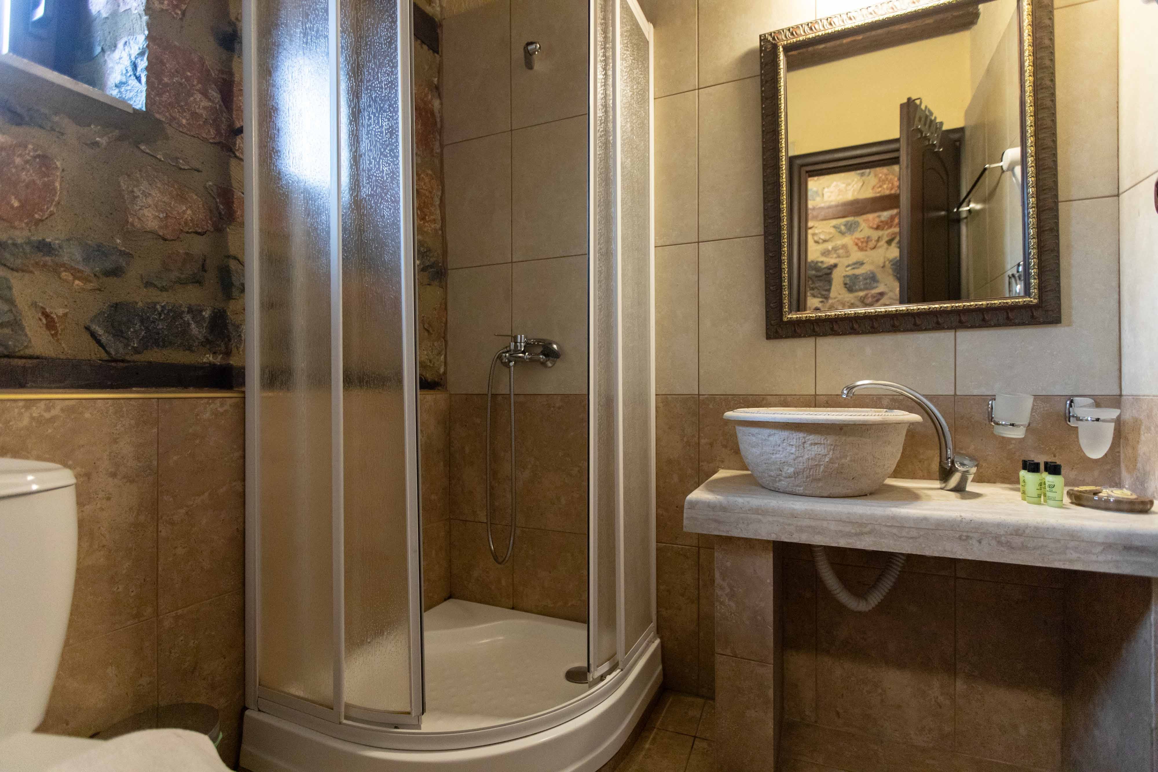 a bathroom with a glass shower