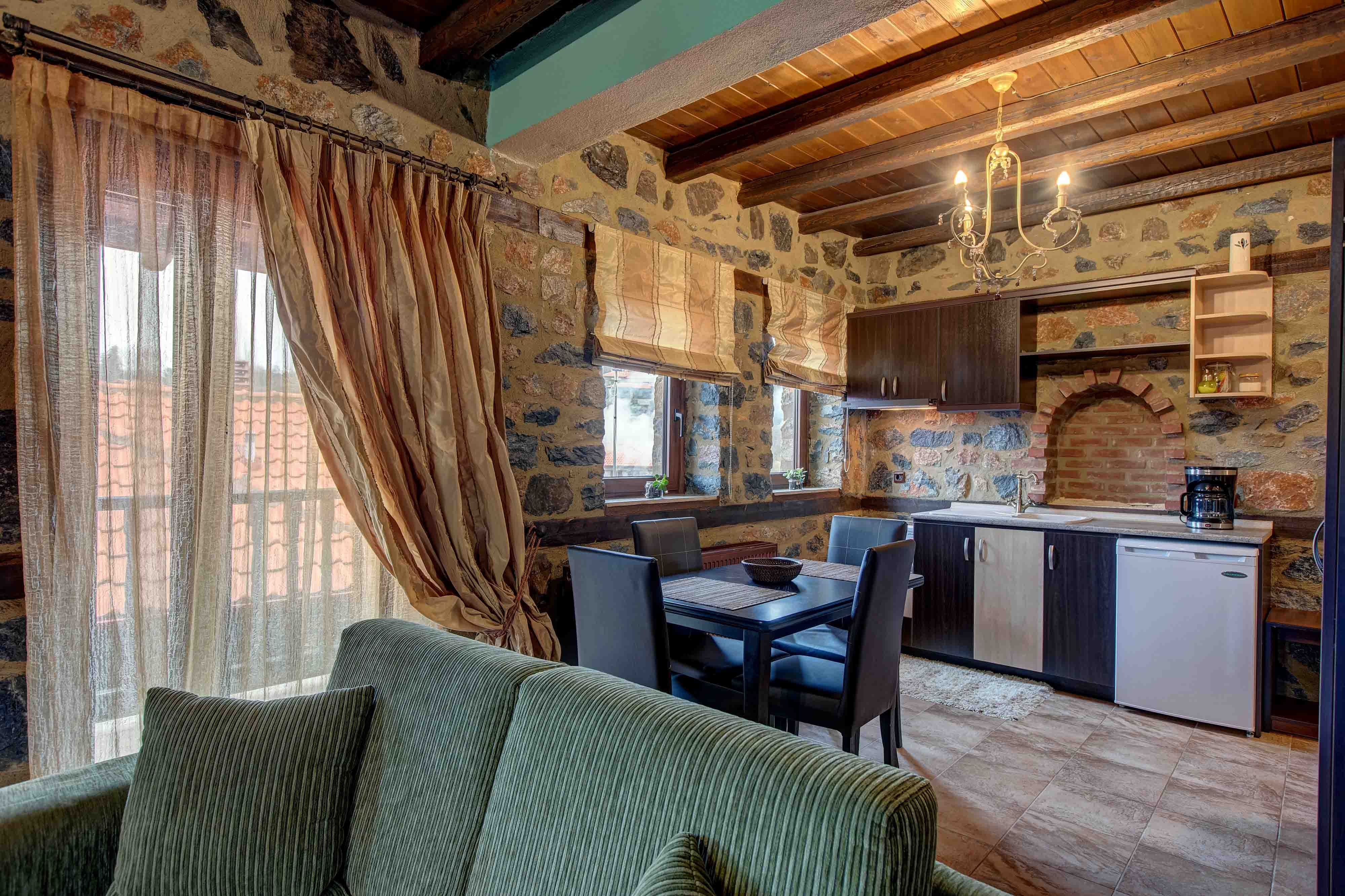 a room with a table and chairs