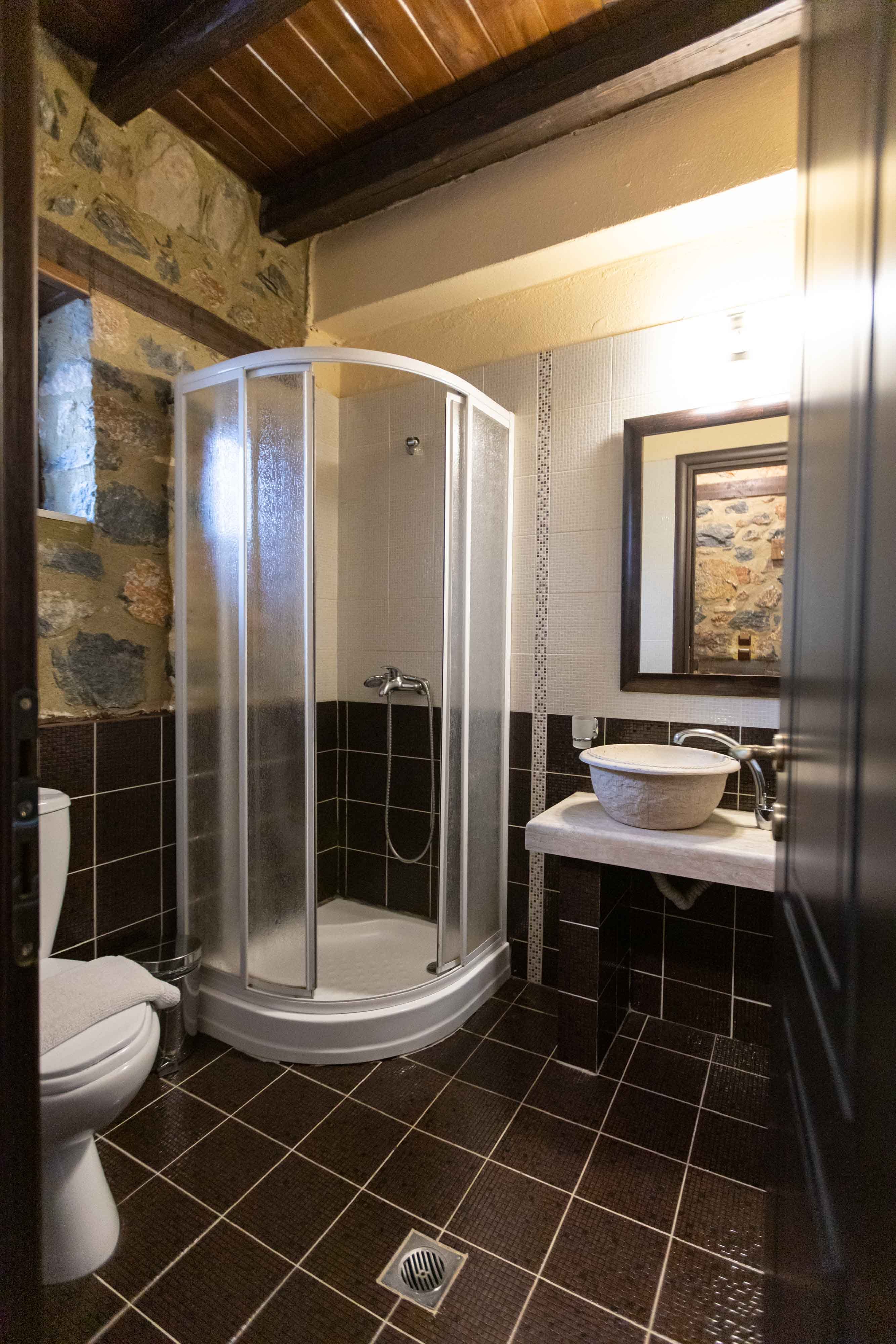 a bathroom with a glass shower