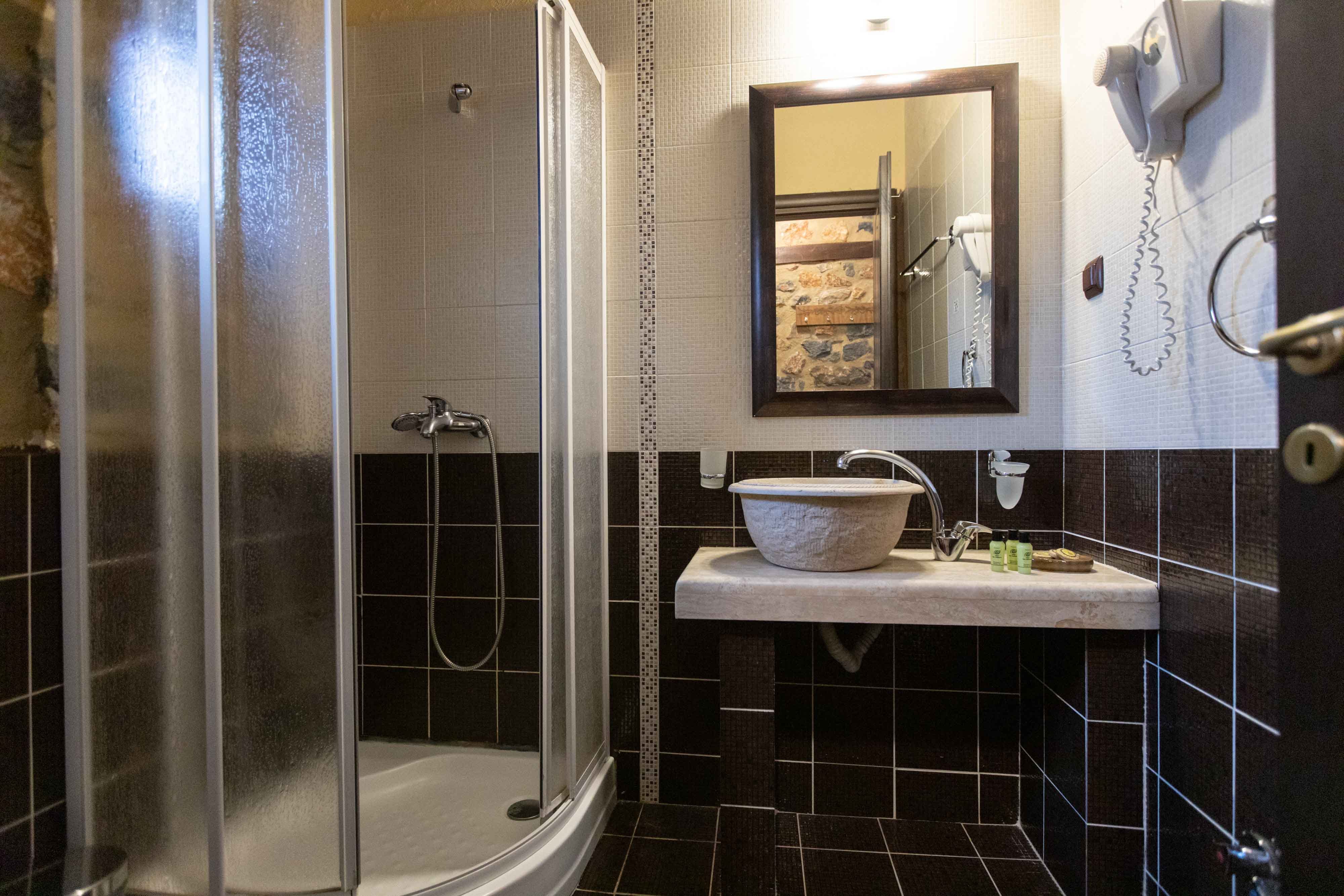 a bathroom with a glass shower
