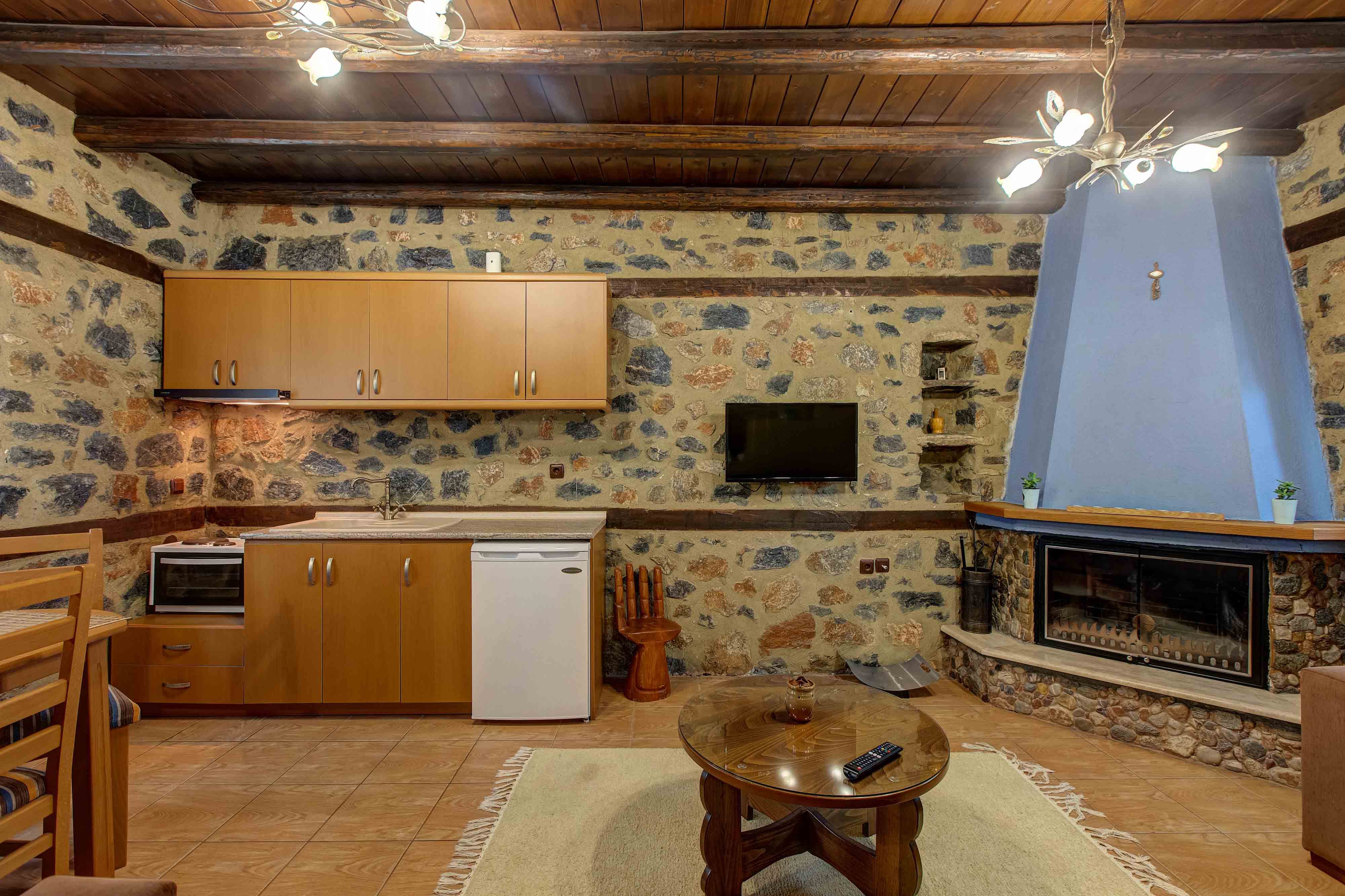 a kitchen with a fireplace