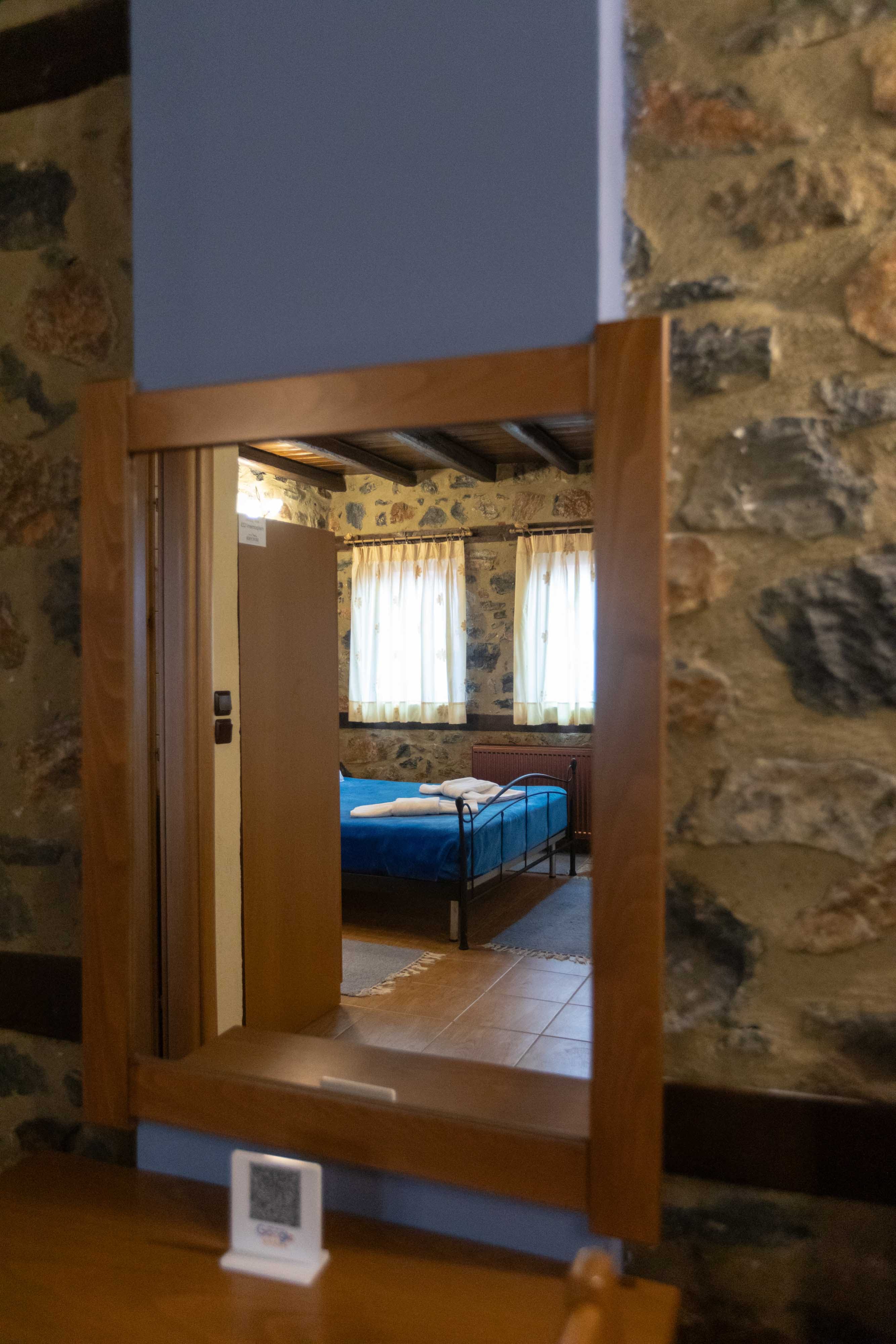 a room with a bed and a window