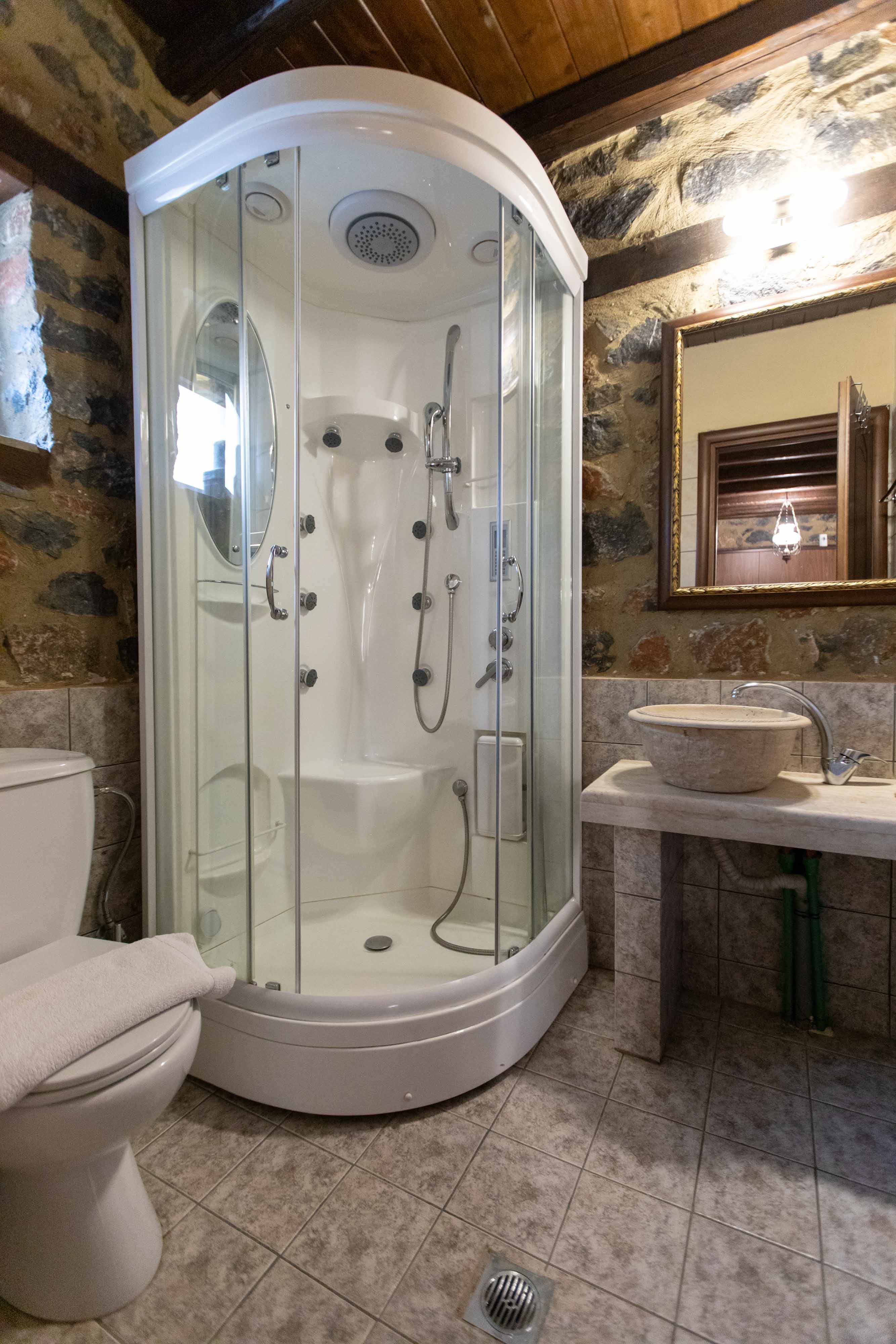 a bathroom with a glass shower