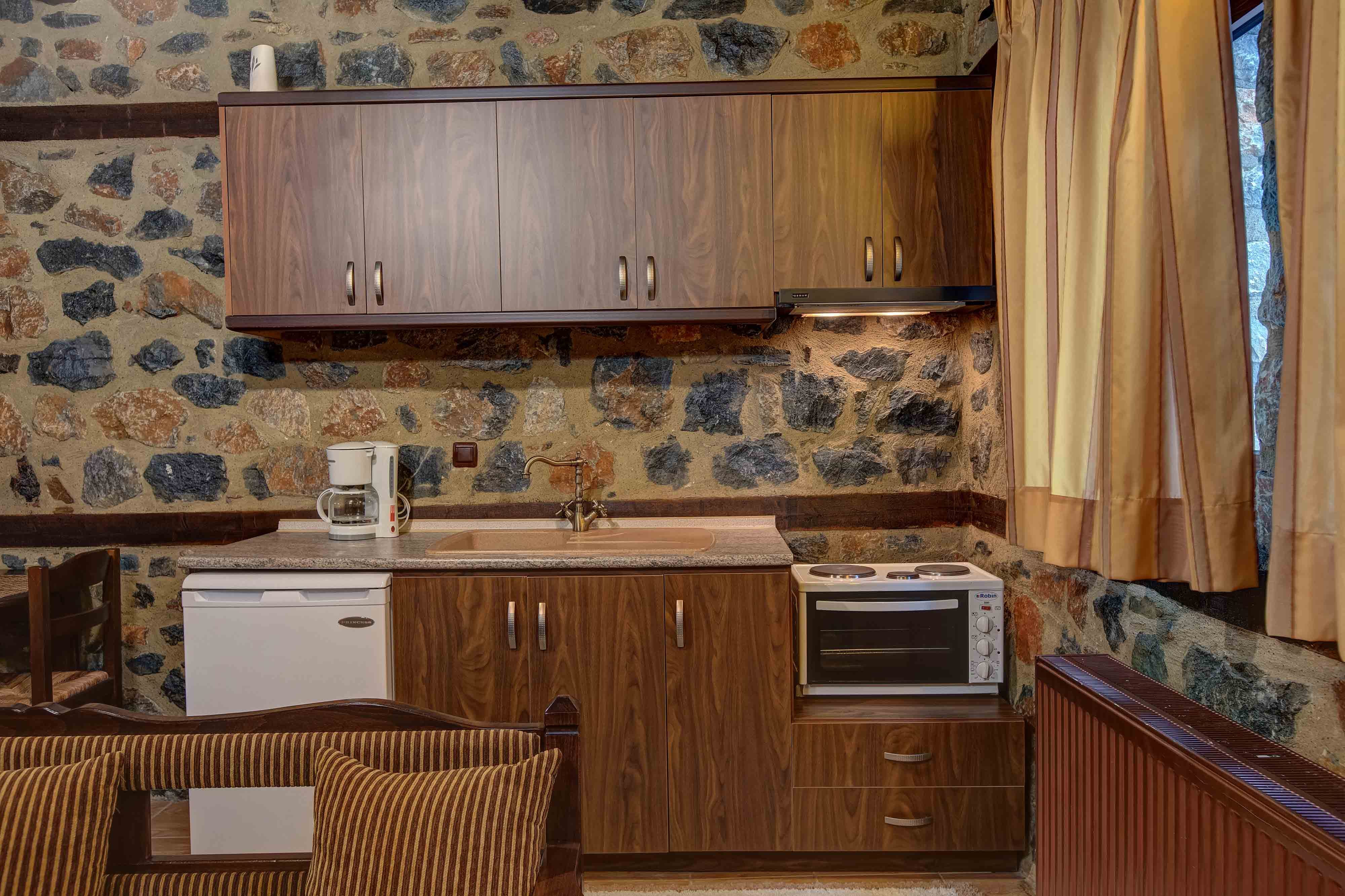 a kitchen with wooden cabinets