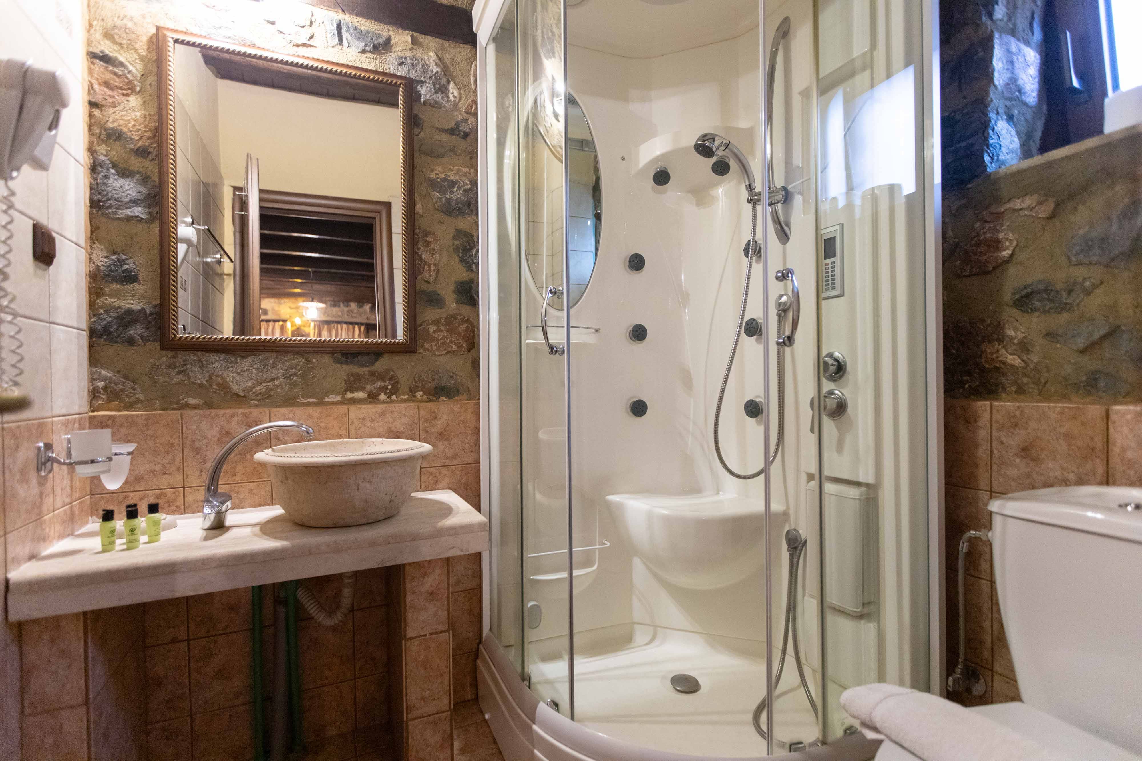 a bathroom with a glass shower