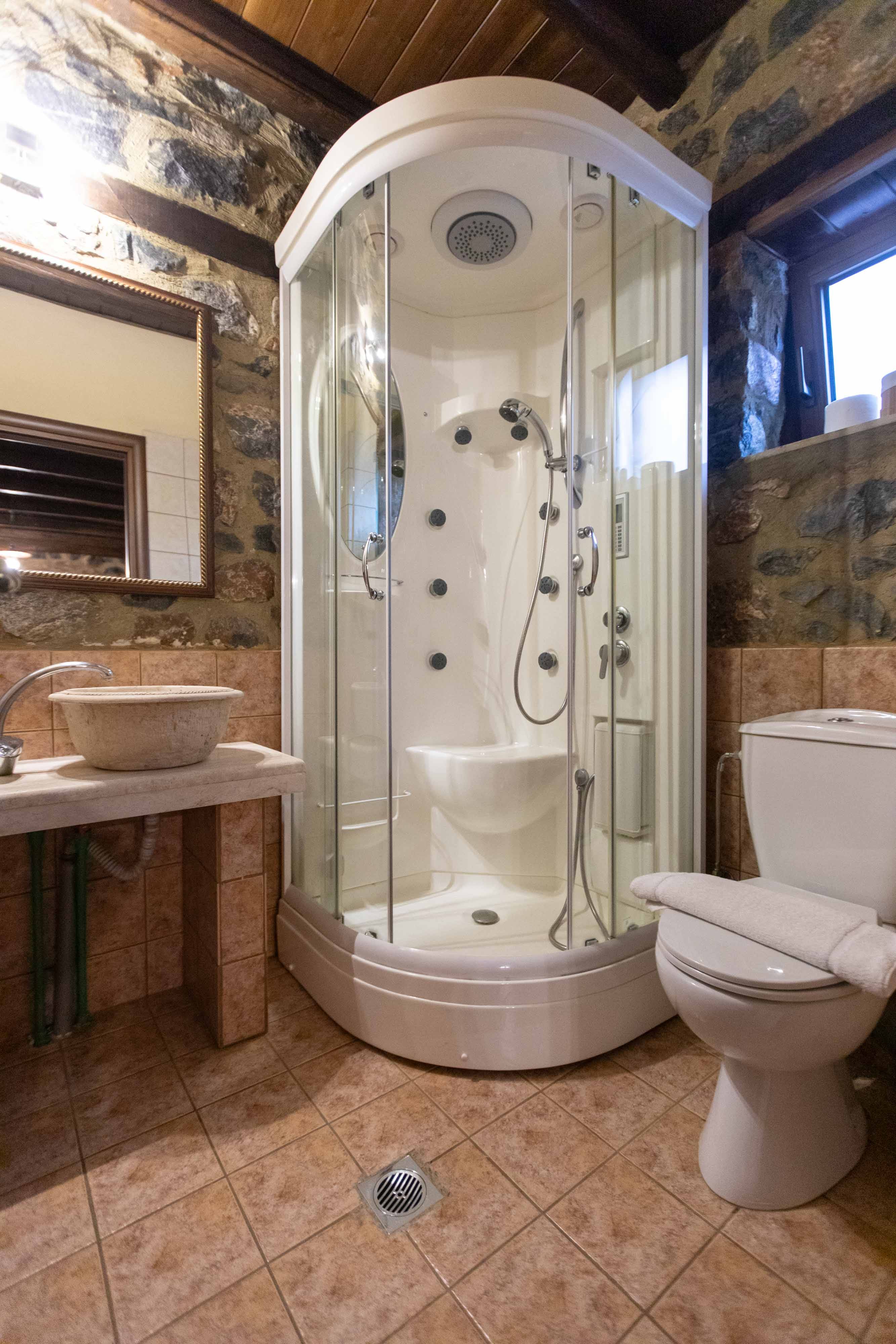 a bathroom with a shower and sink