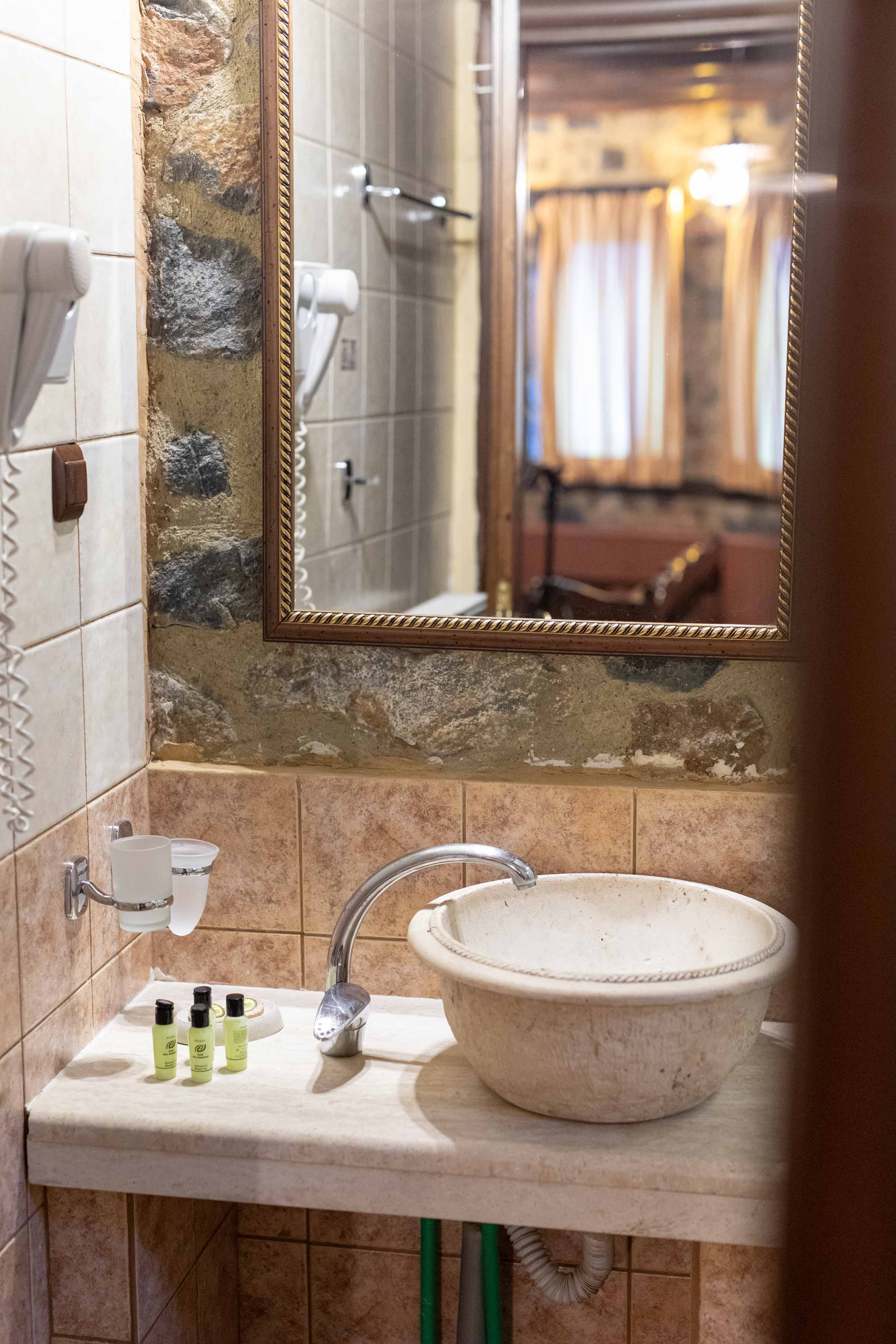 a bathroom with a large mirror