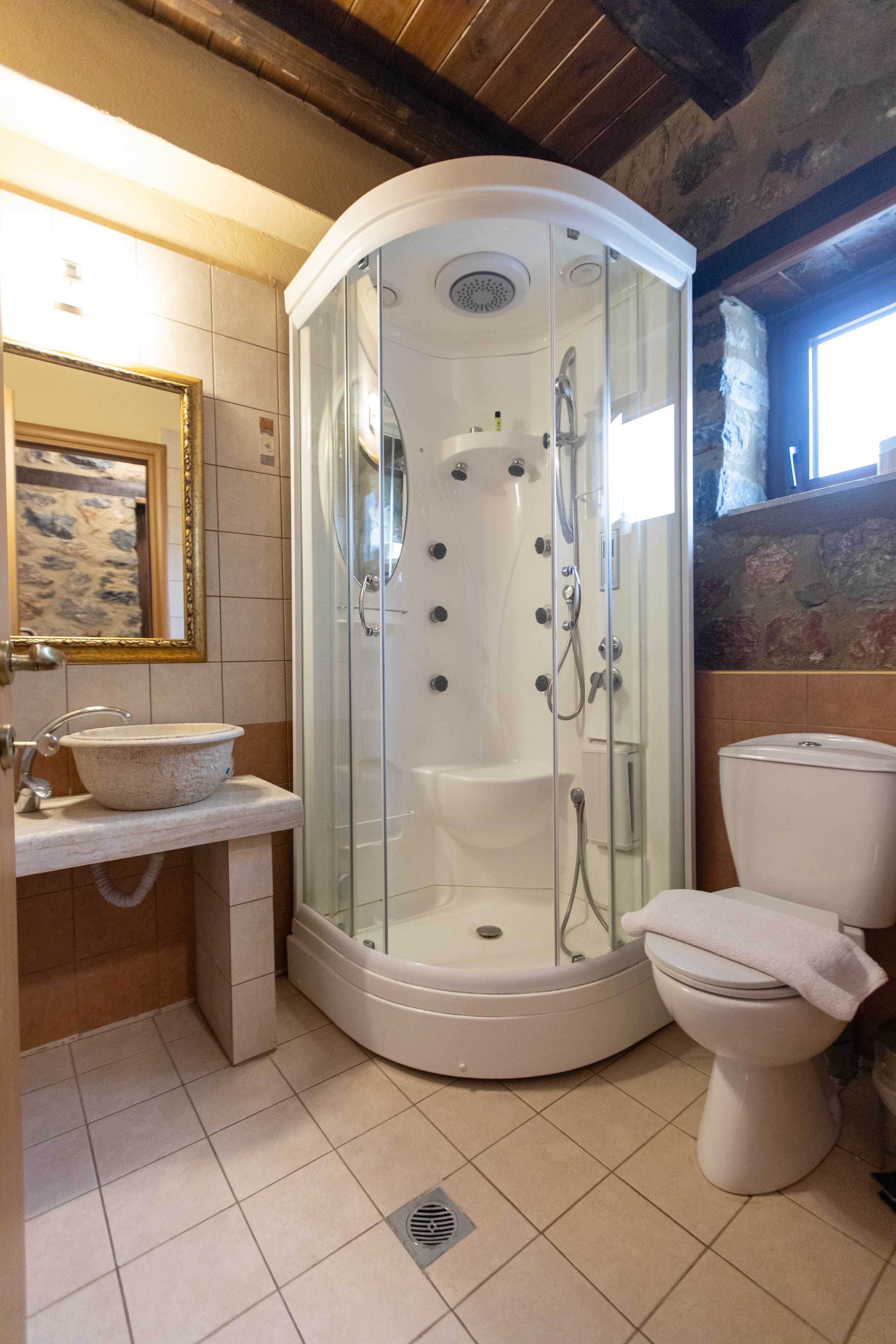 a bathroom with a glass shower